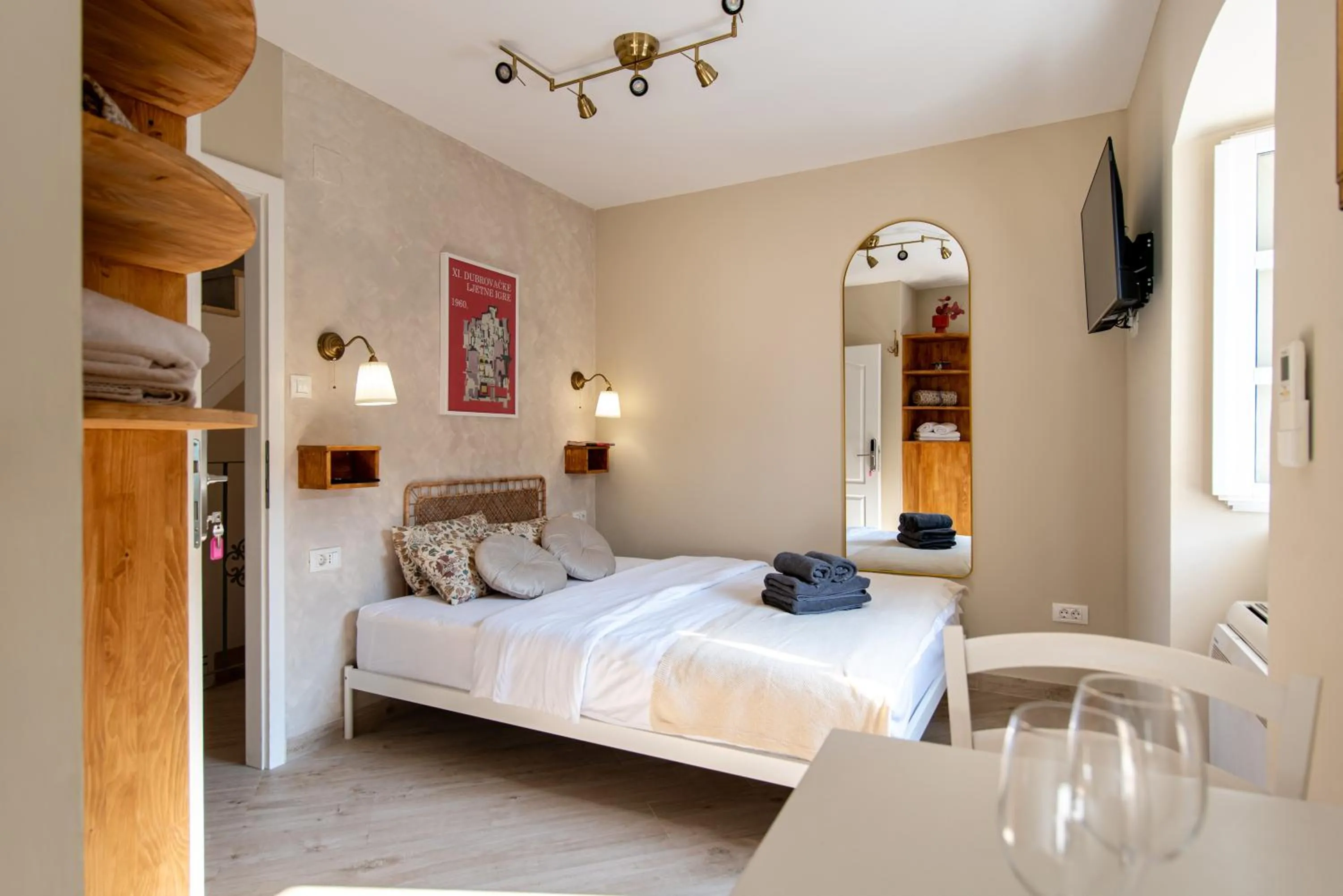 Bed in Ragusa City Walls Apartments