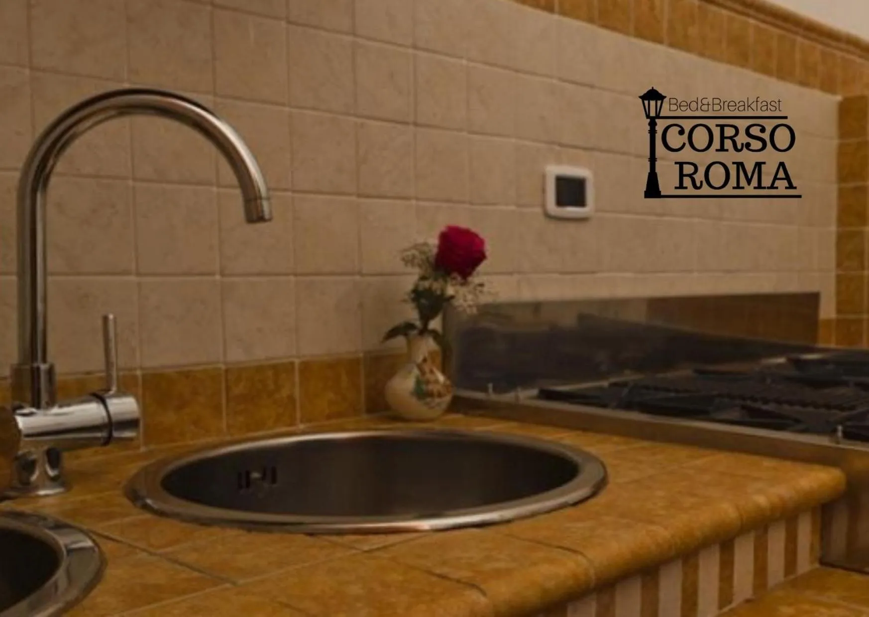 Kitchen or kitchenette in B&B Corso Roma