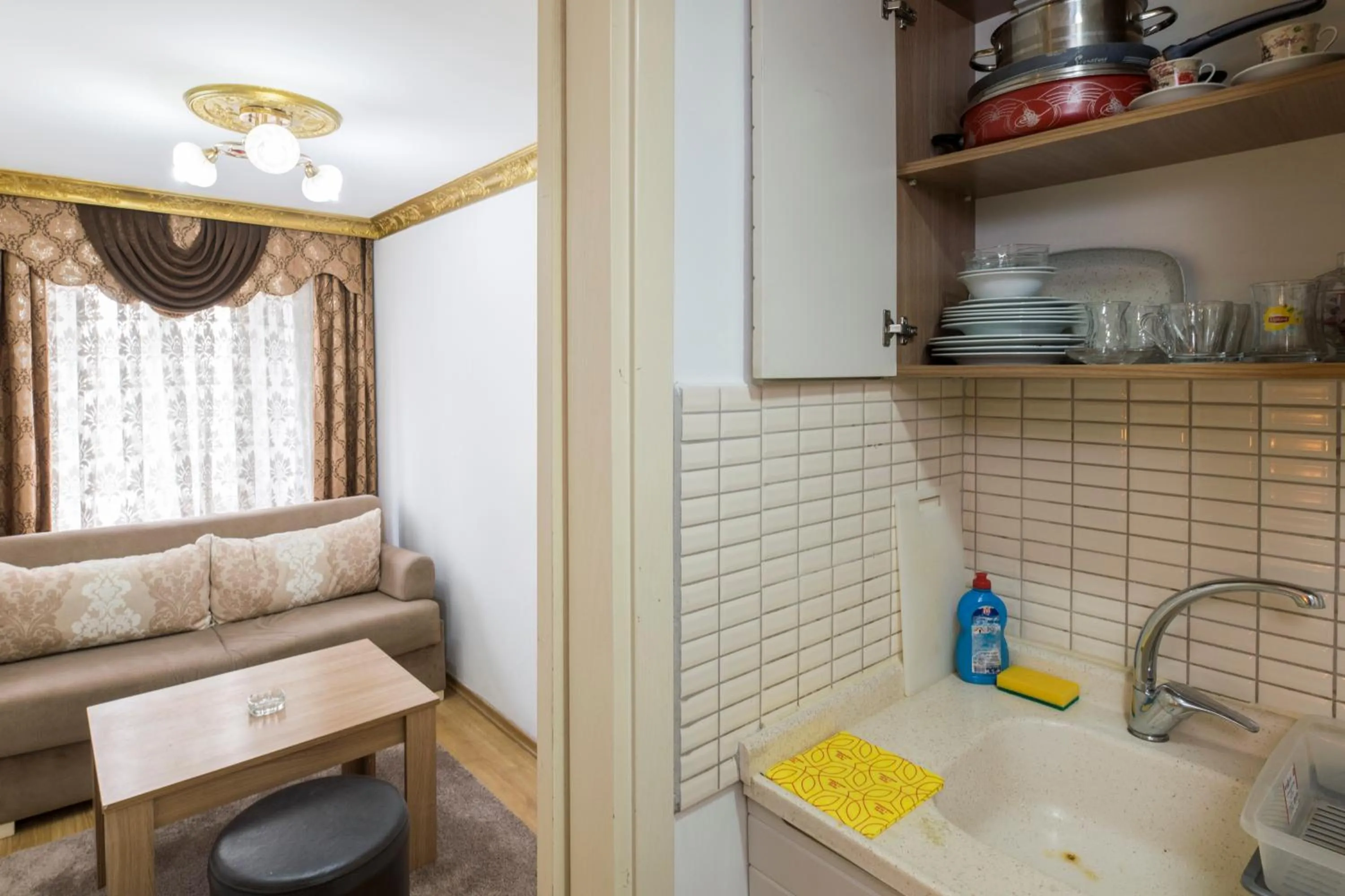 Kitchen or kitchenette in Punto Suite