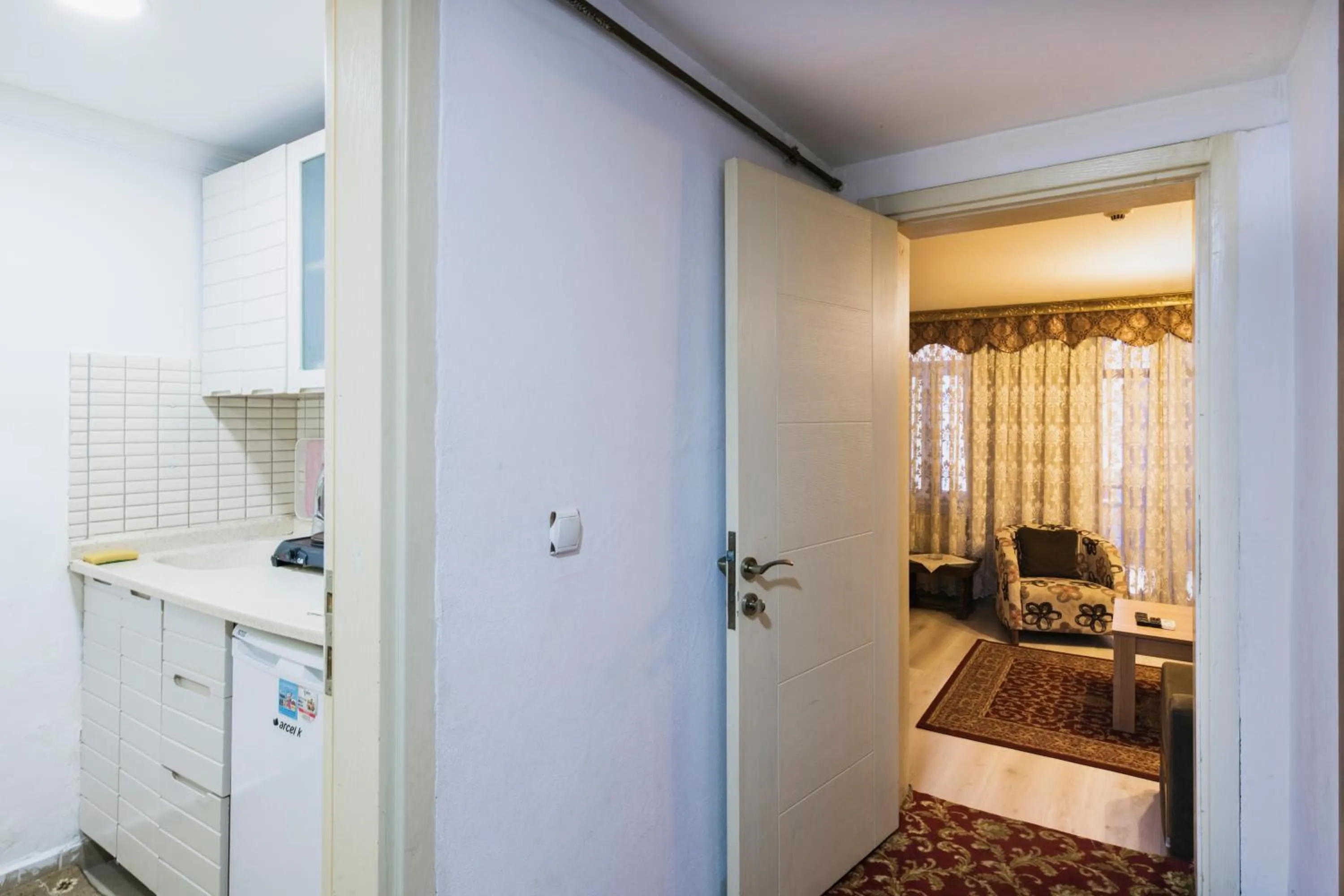 Communal lounge/ TV room in Punto Suite