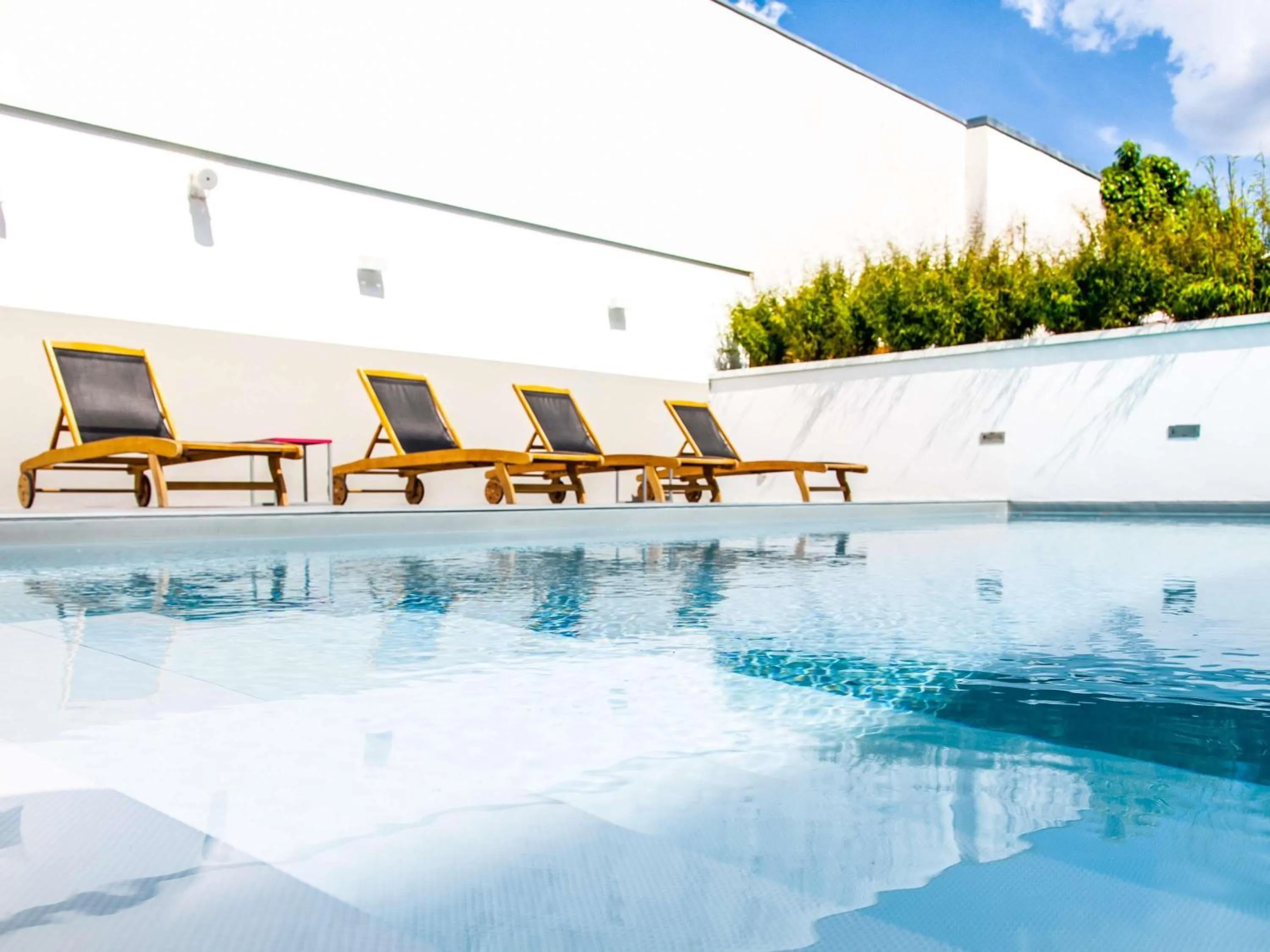 Pool view in Novotel Blois Centre Val De Loire