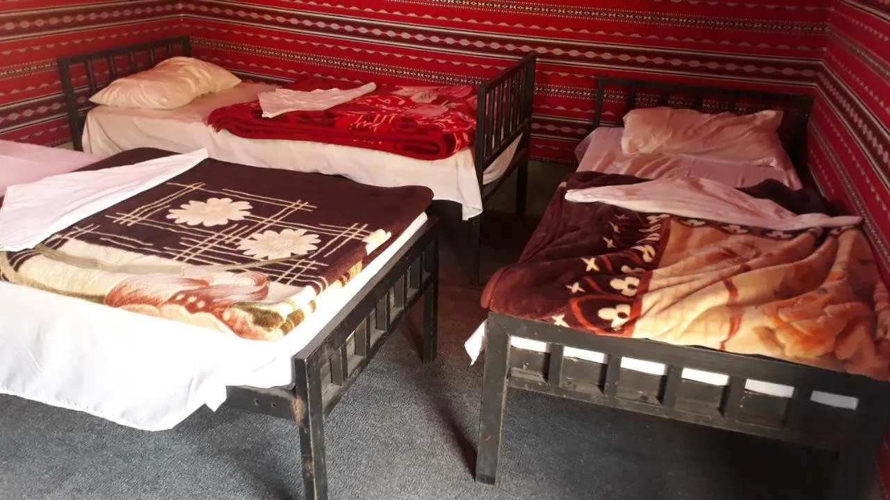 Bed in WadiRum Mobile Camp