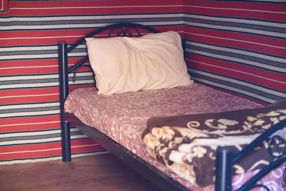 Bed in WadiRum Mobile Camp