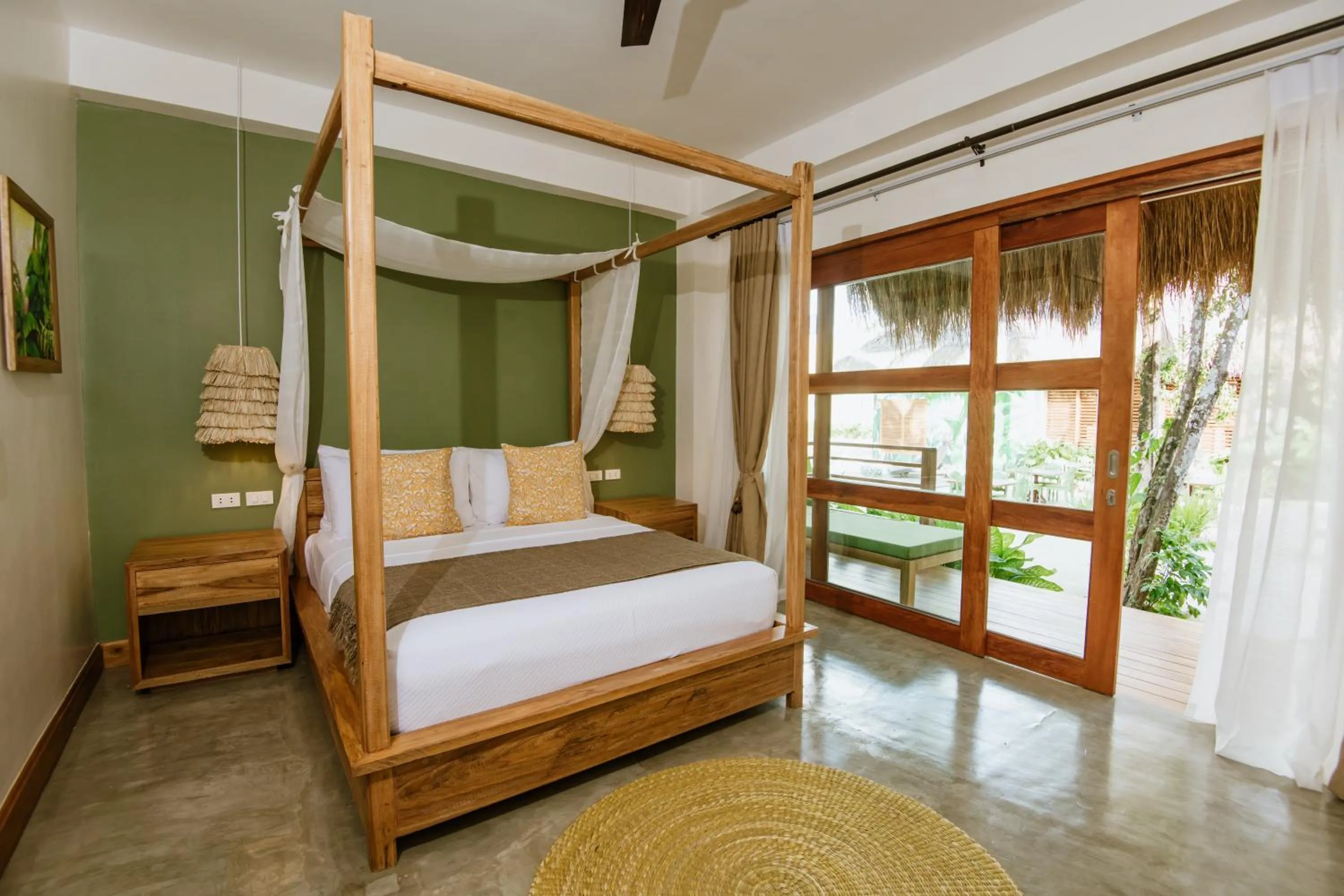 Bed in Las Palmas Villas and Casitas Siargao