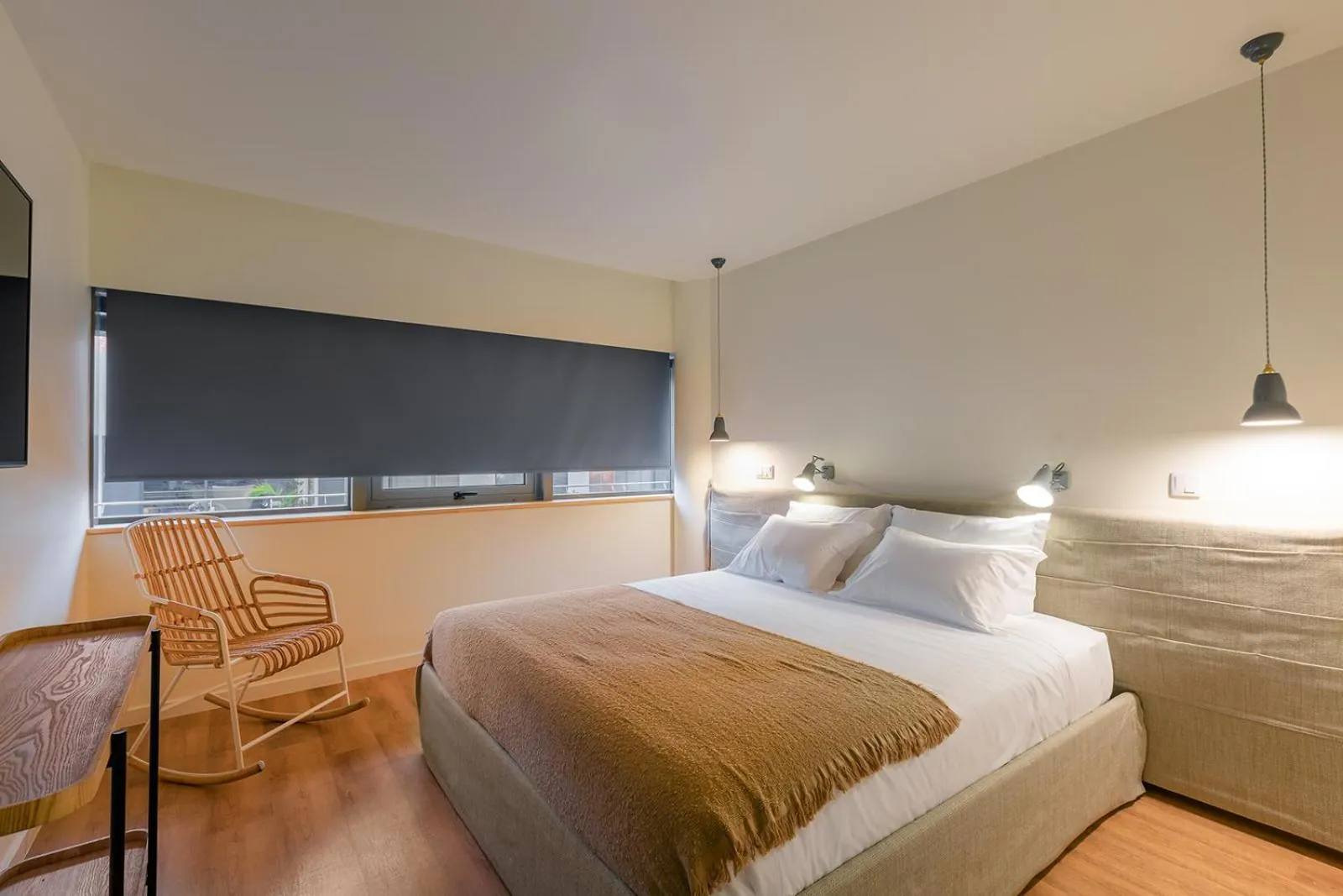 Bed in Three House Hotel