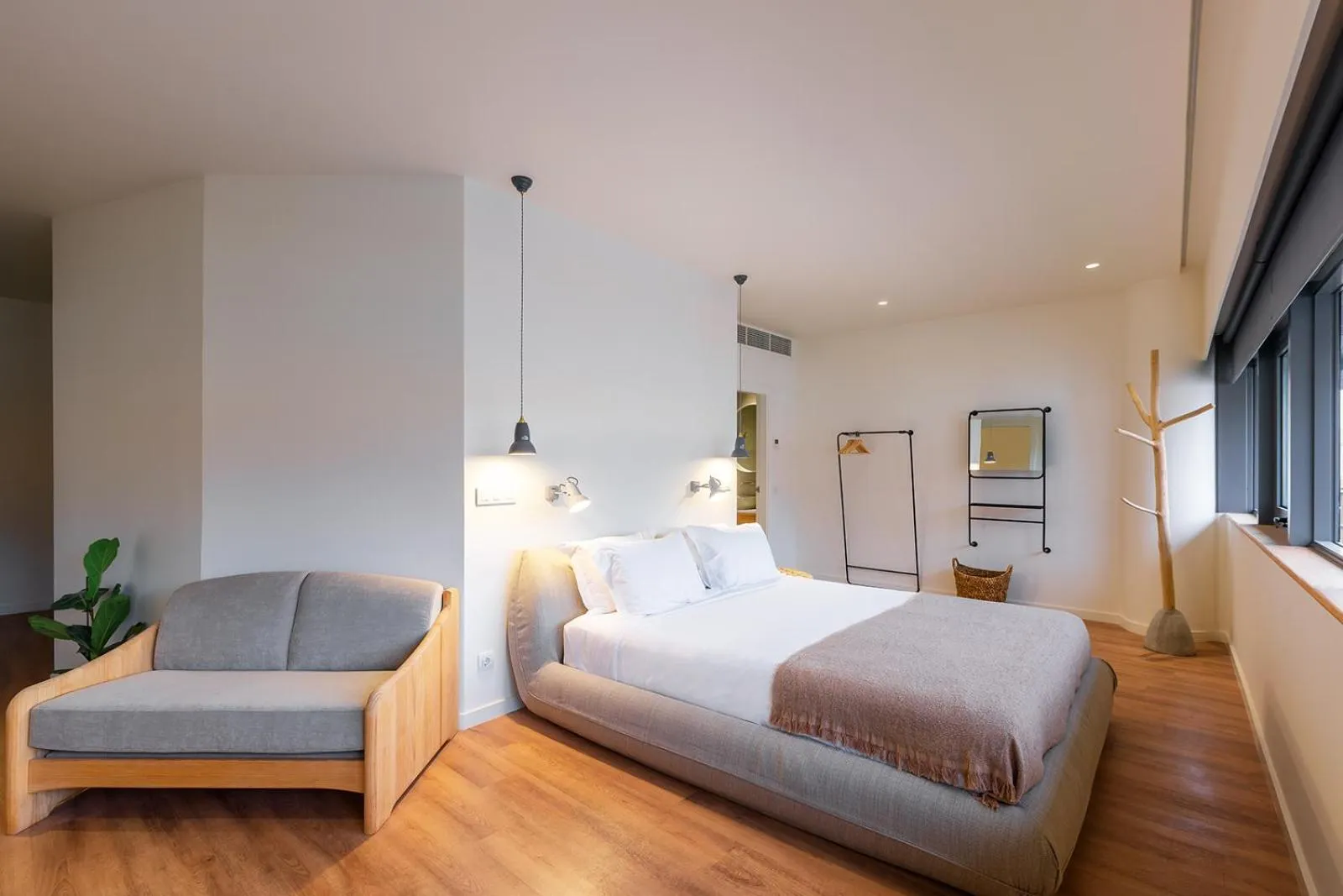 Bed in Three House Hotel