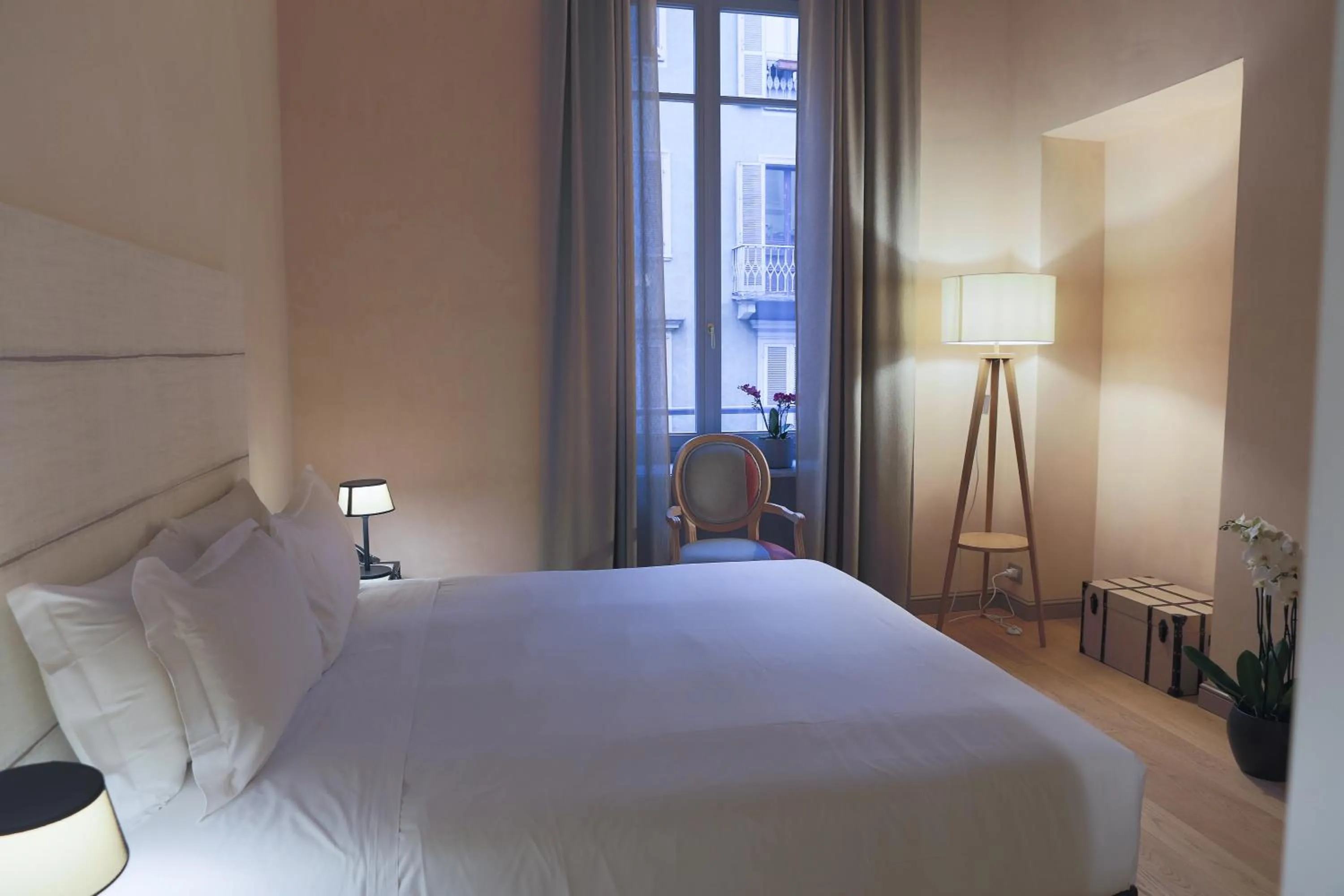 Bed in Opera35 Boutique Hotel