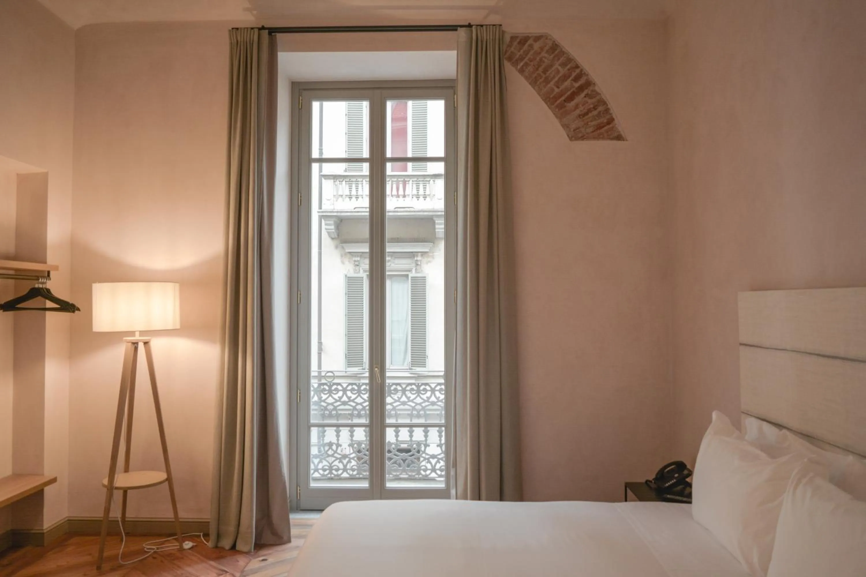 Bed in Opera35 Boutique Hotel