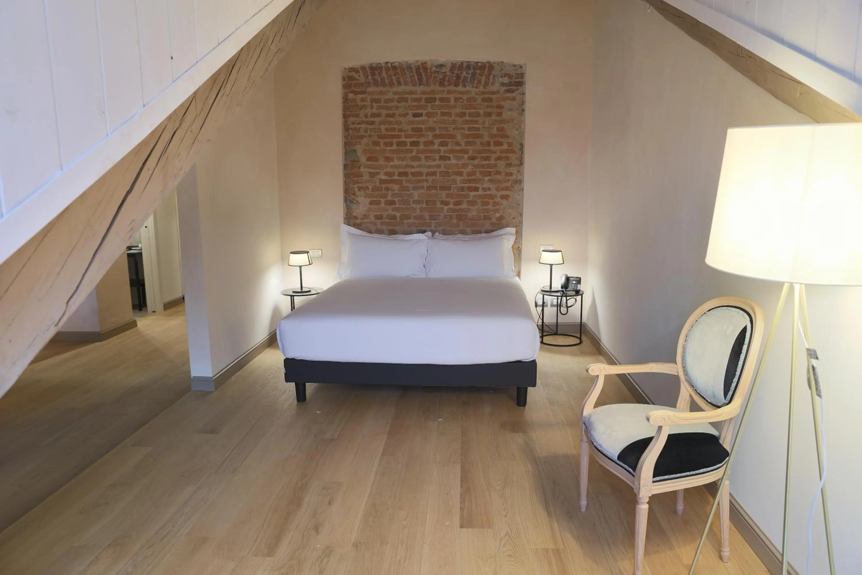 Bed in Opera35 Boutique Hotel