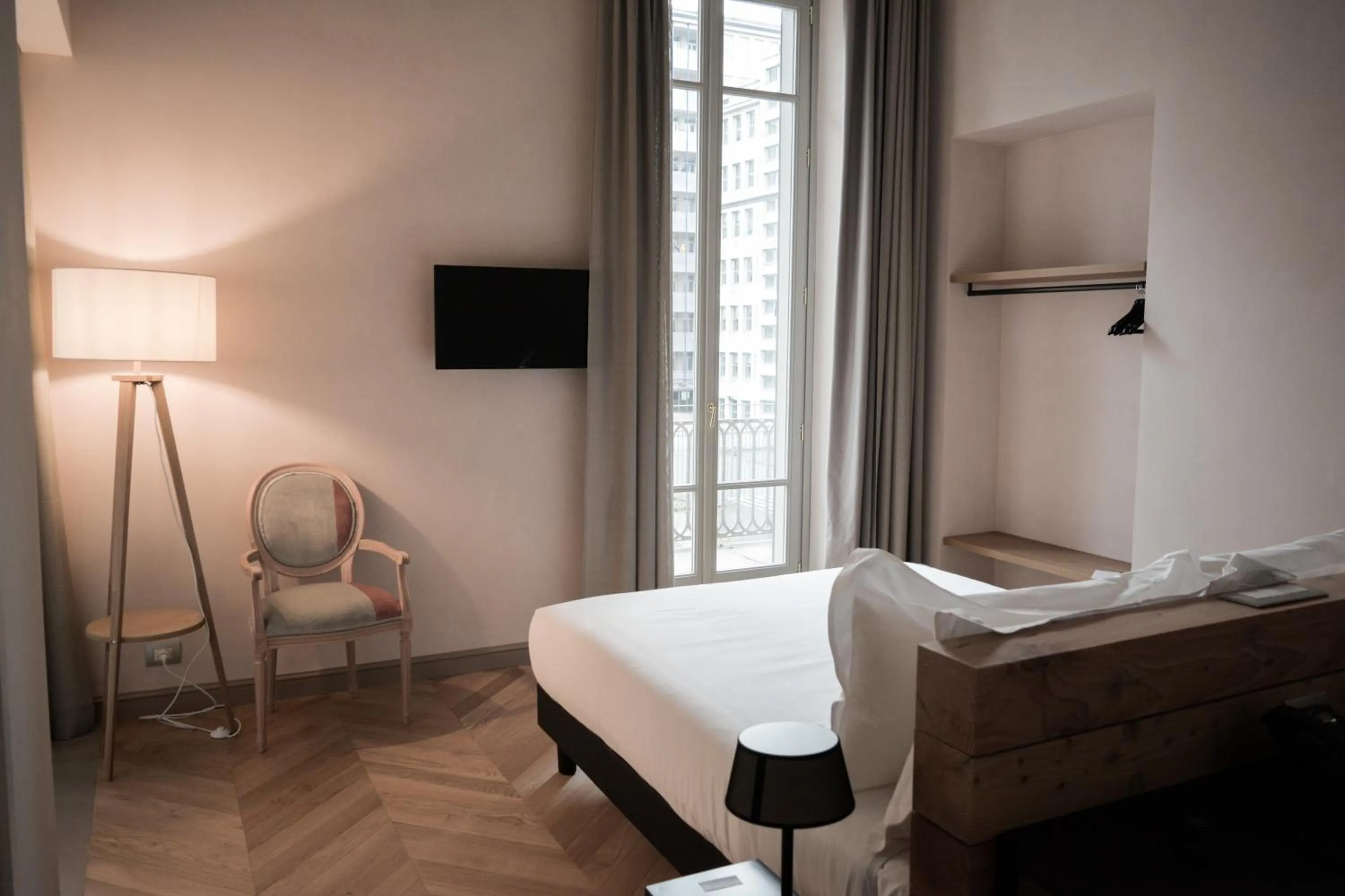 Bed in Opera35 Boutique Hotel