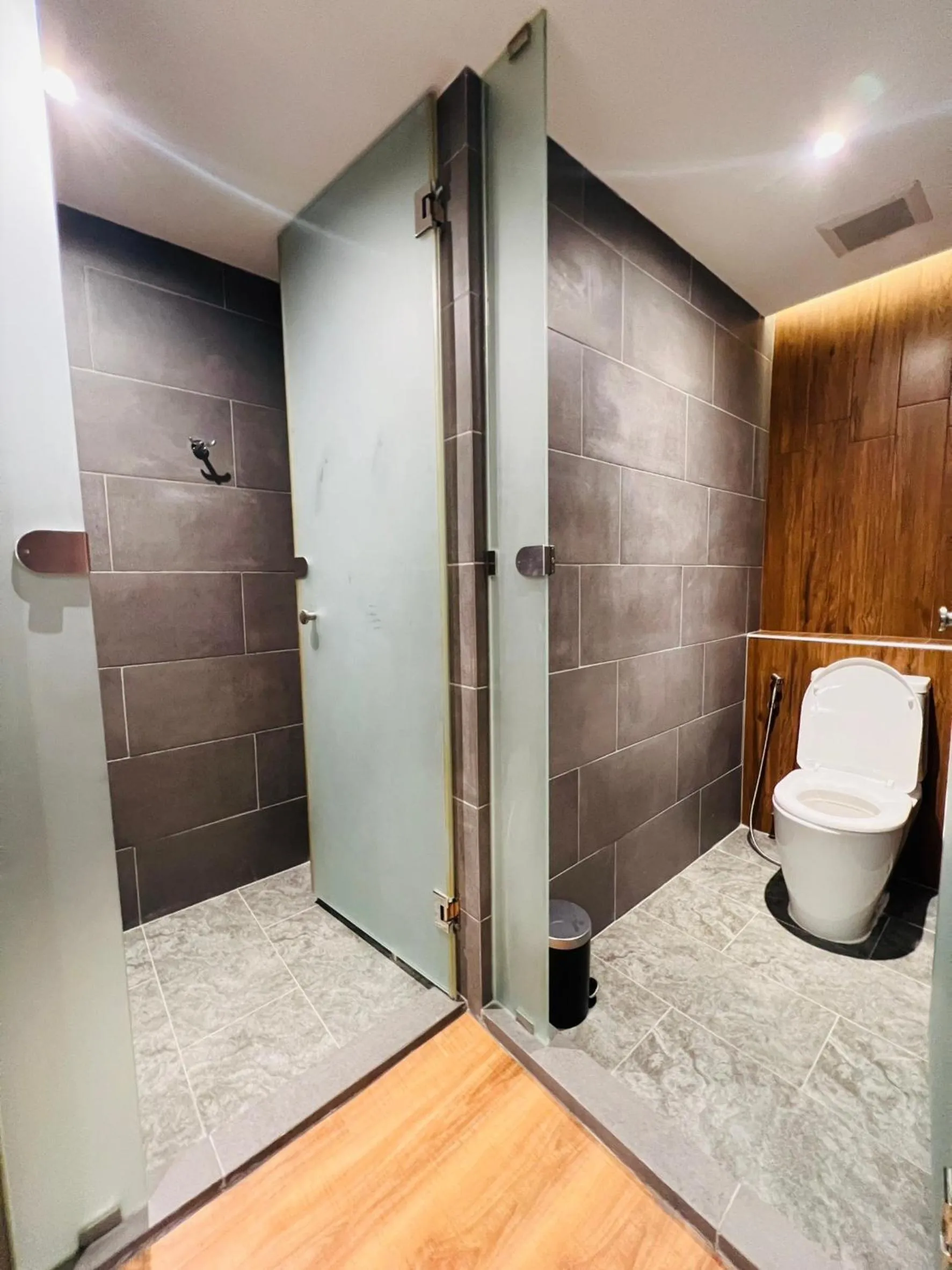 Shower in Woodstory Boutique Hotel