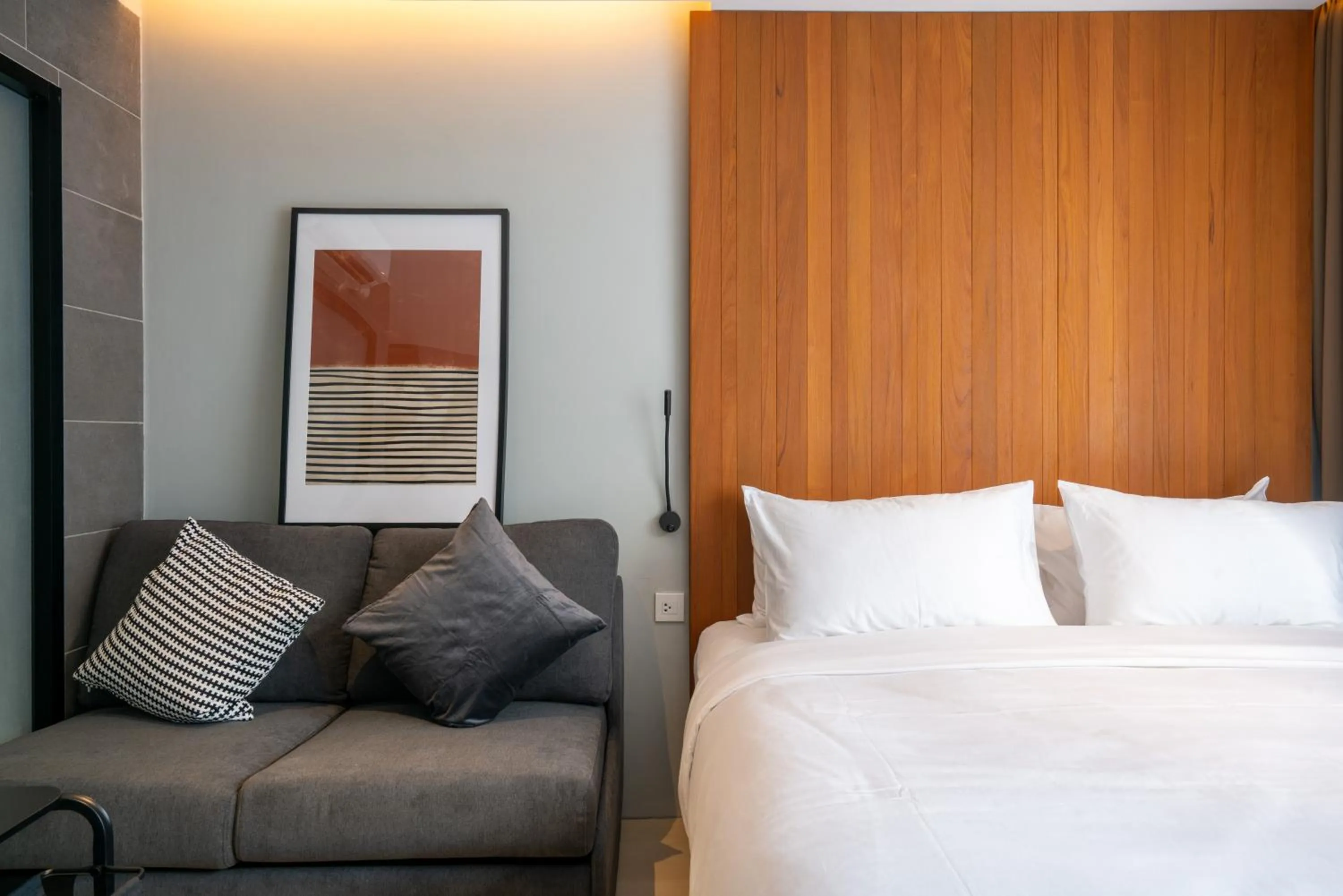 Bed in Woodstory Boutique Hotel