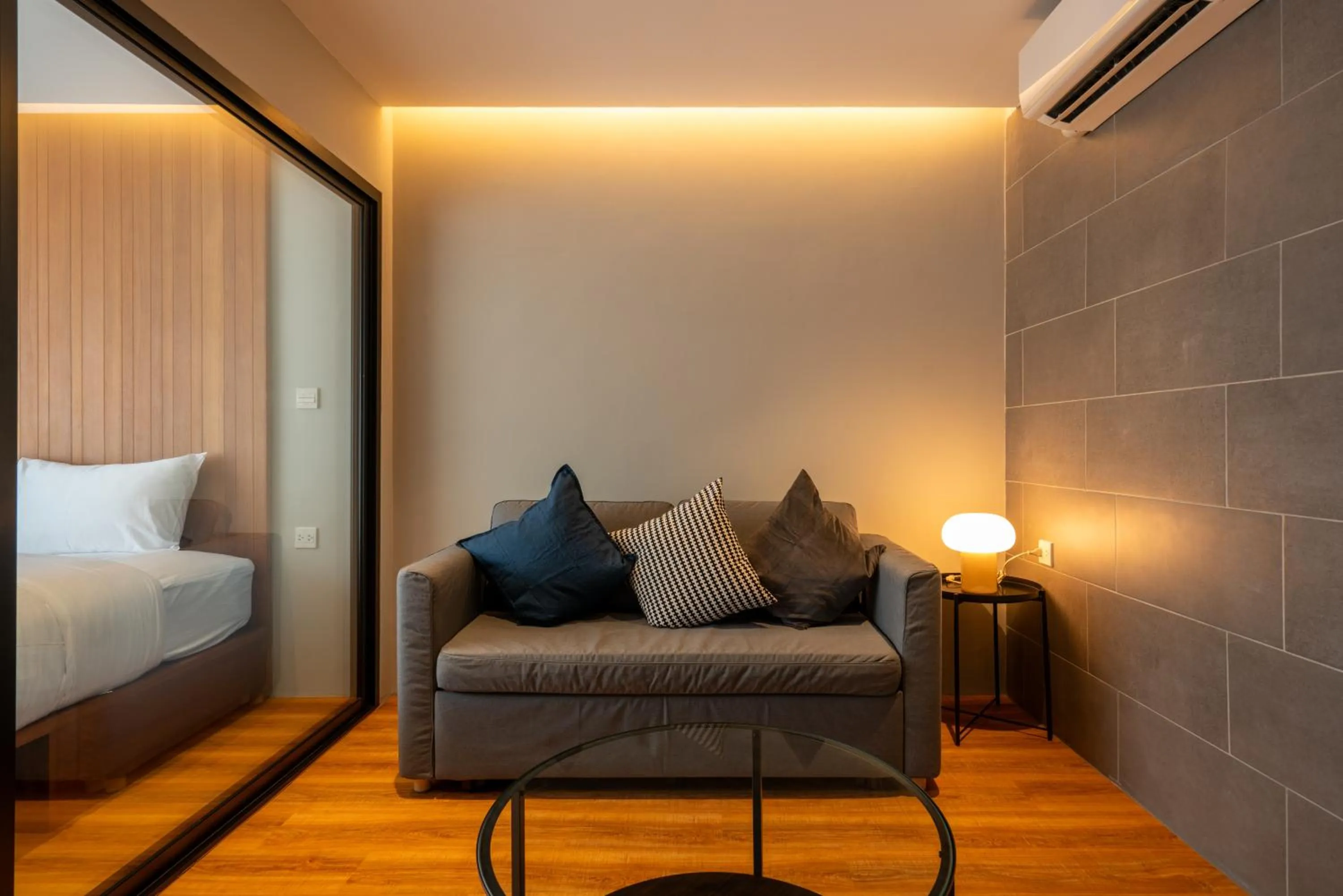 Living room, Bed in Woodstory Boutique Hotel