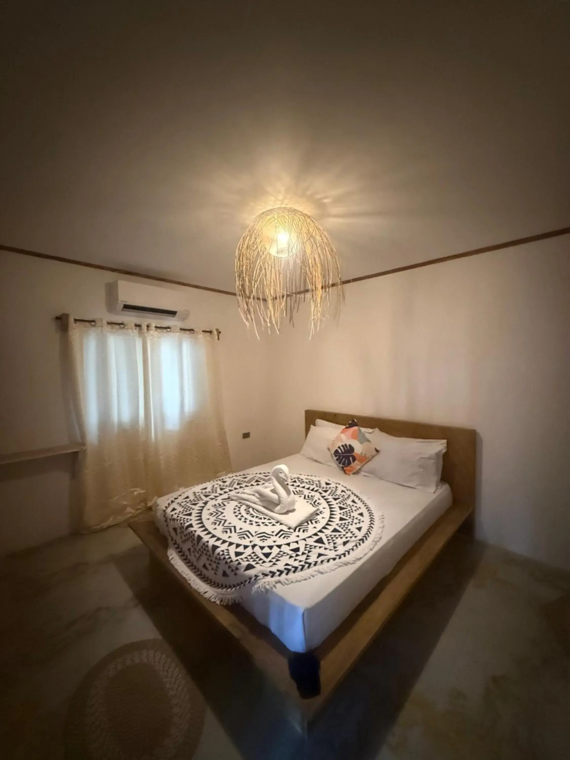 Bed in Zhaya's Beach & Cottages Bed in Zhaya's Beach & Cottages