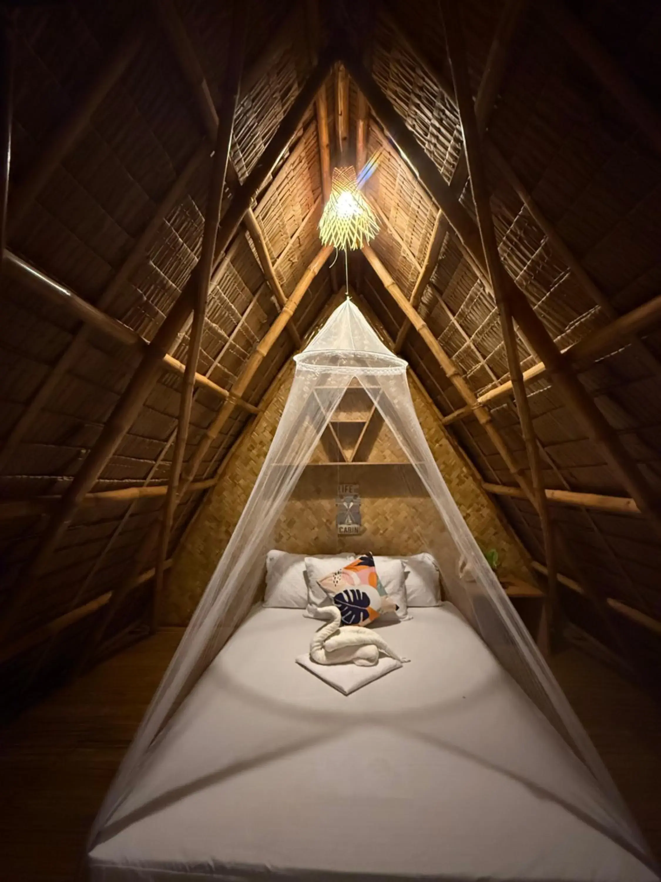 Bed in Zhaya's Beach & Cottages Bed in Zhaya's Beach & Cottages