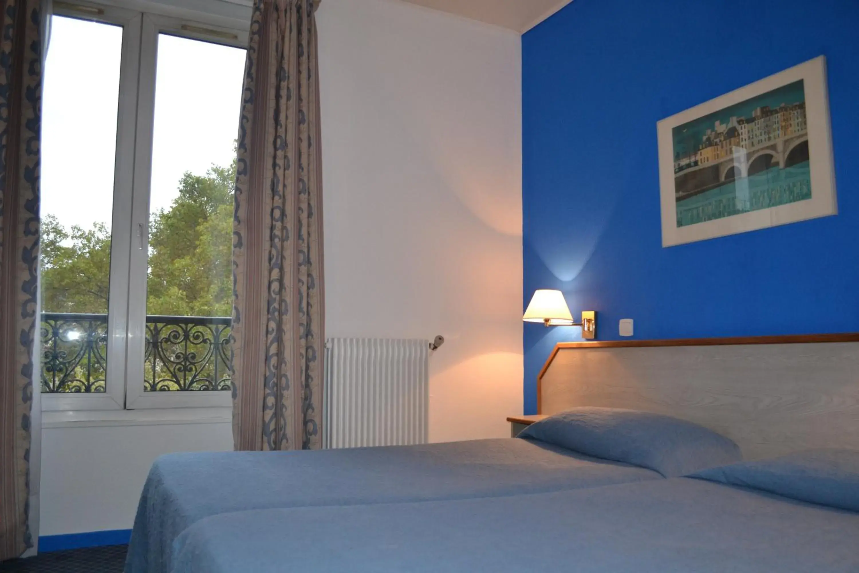 Bed in Hotel William's Opera Bed in Hotel William's Opera