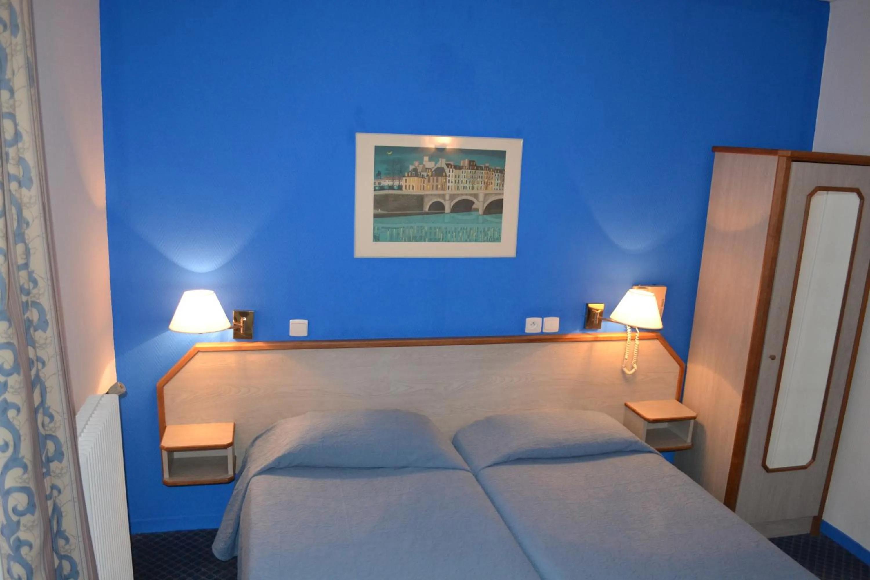 Bed in Hotel William's Opera