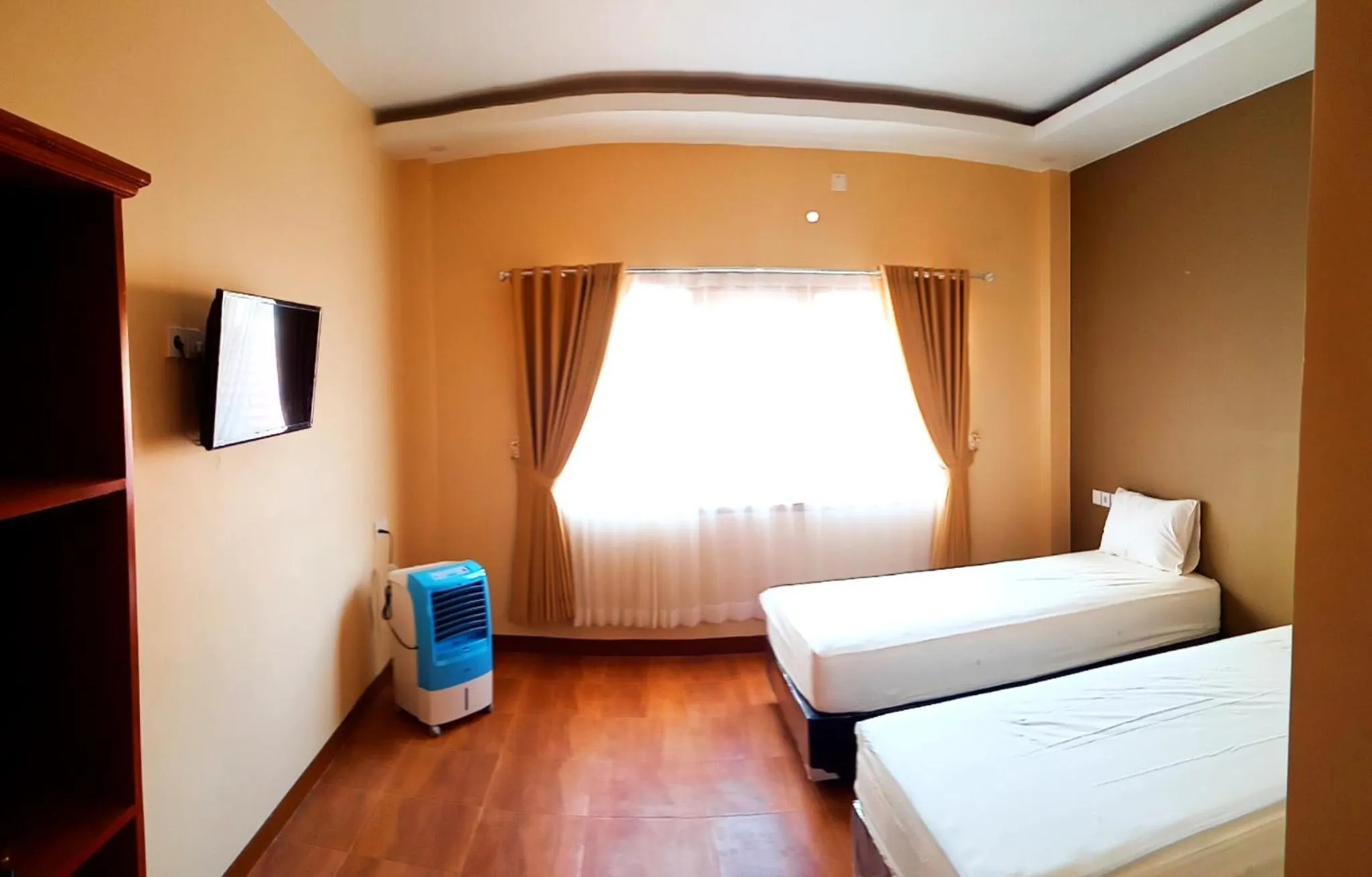 Photo of the whole room, Bed in Bluefire Homestay Syariah