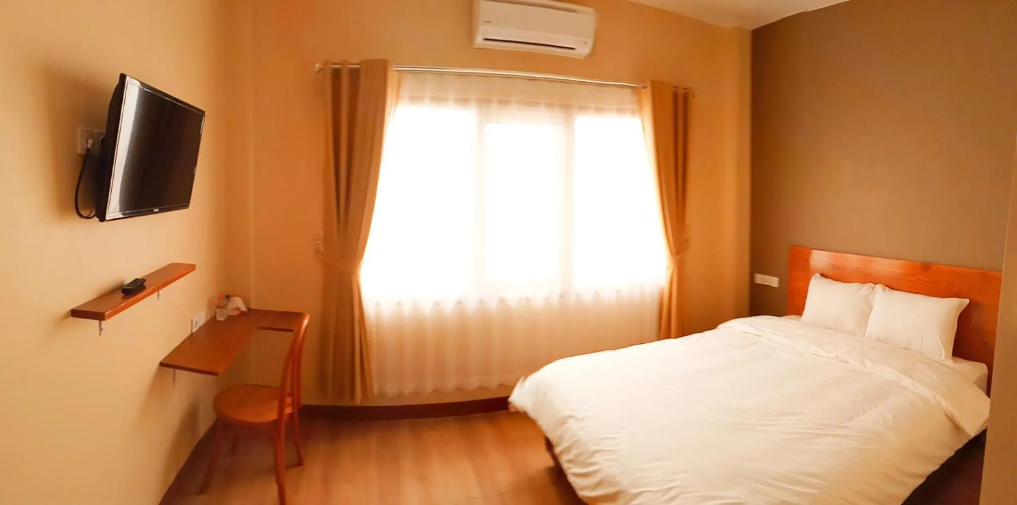 Photo of the whole room, Bed in Bluefire Homestay Syariah