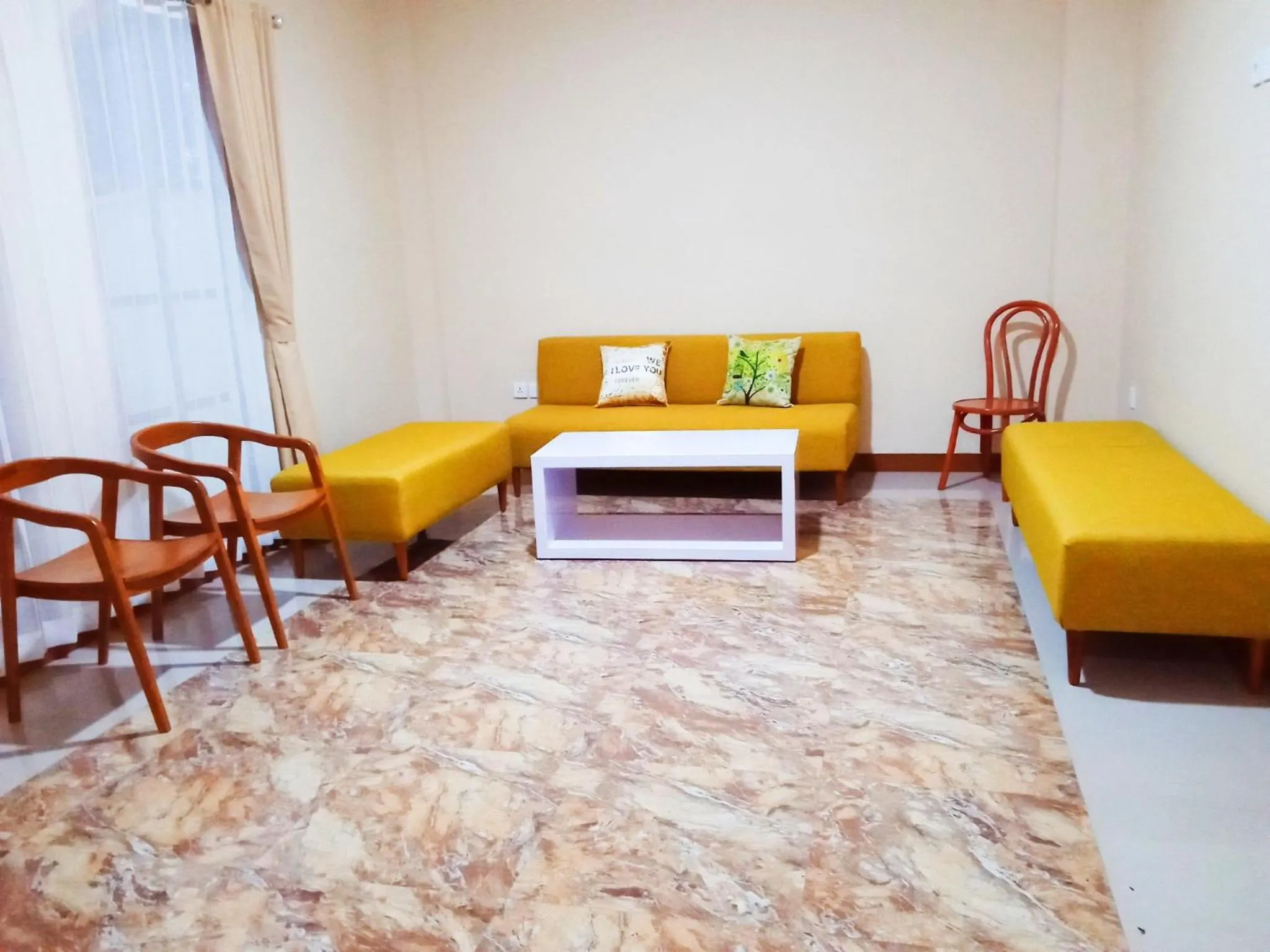 Seating area in Bluefire Homestay Syariah