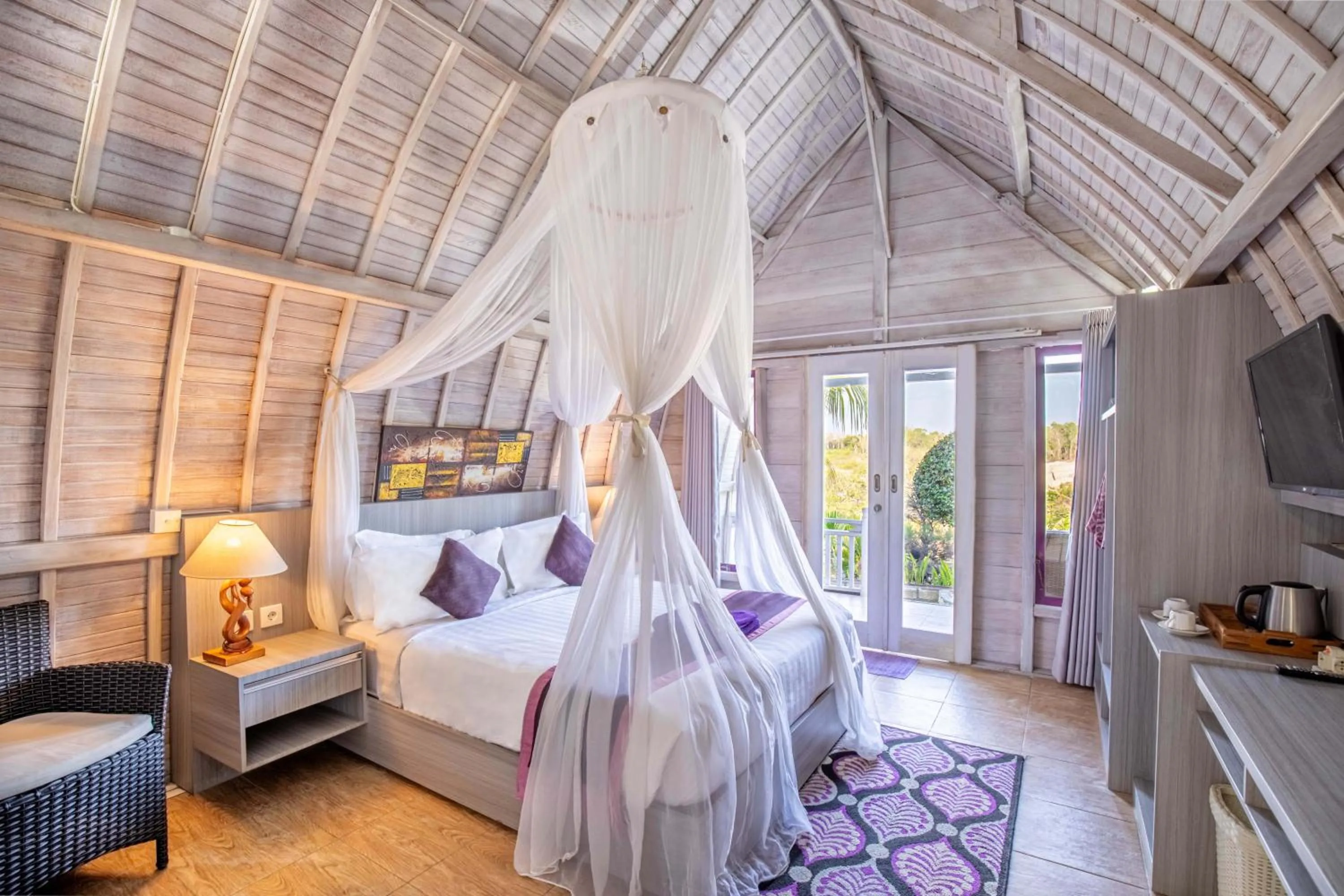 Bed in Akusara Jungle Resort And Spa