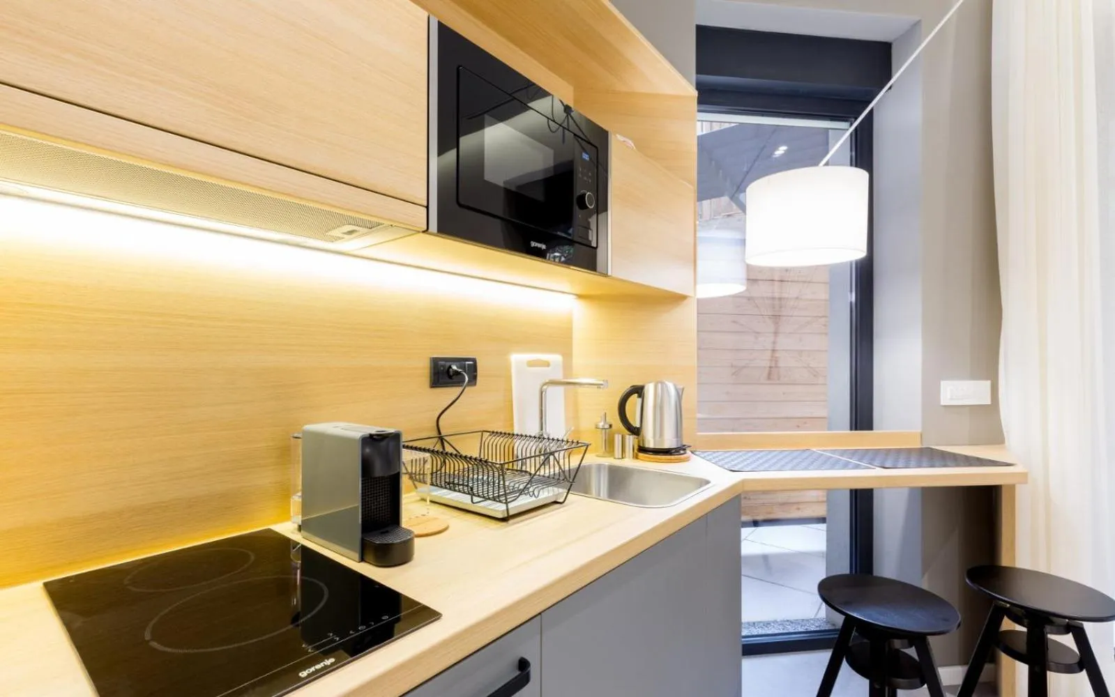 Kitchen or kitchenette in Teanna Lux Apartments