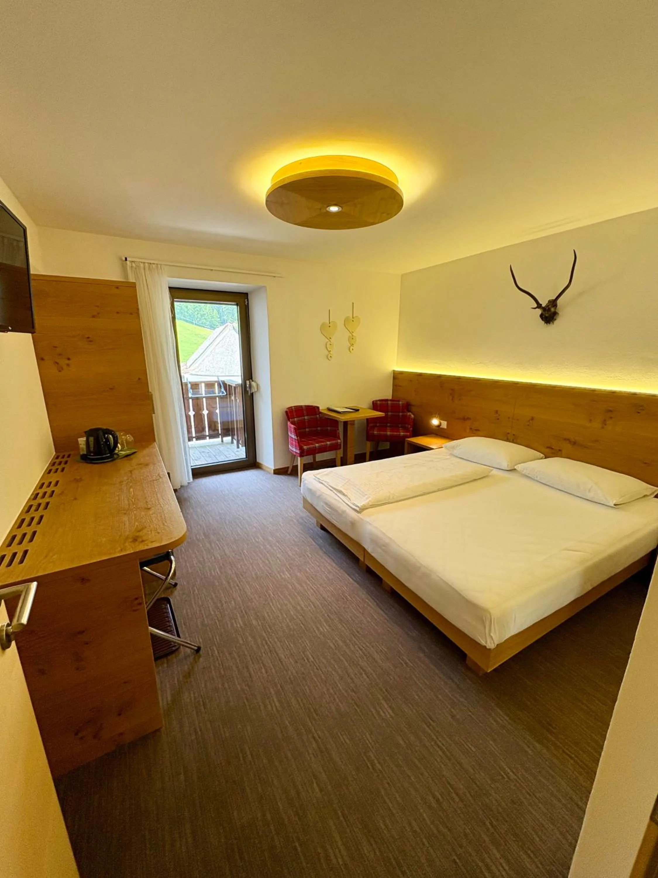 Photo of the whole room, Bed in Garni Apparthotel St Valentin