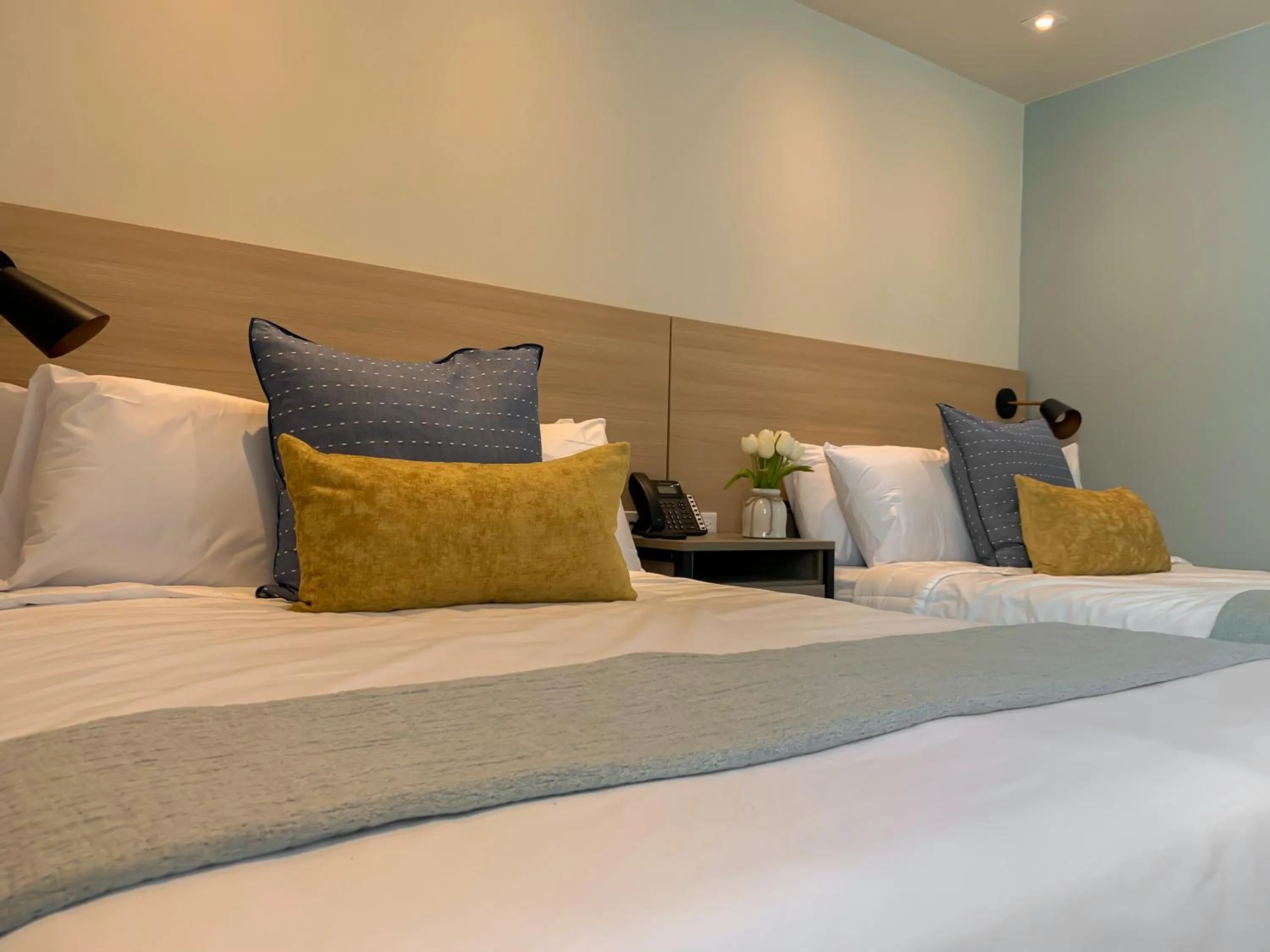 Bedroom in The Ivy Hotel