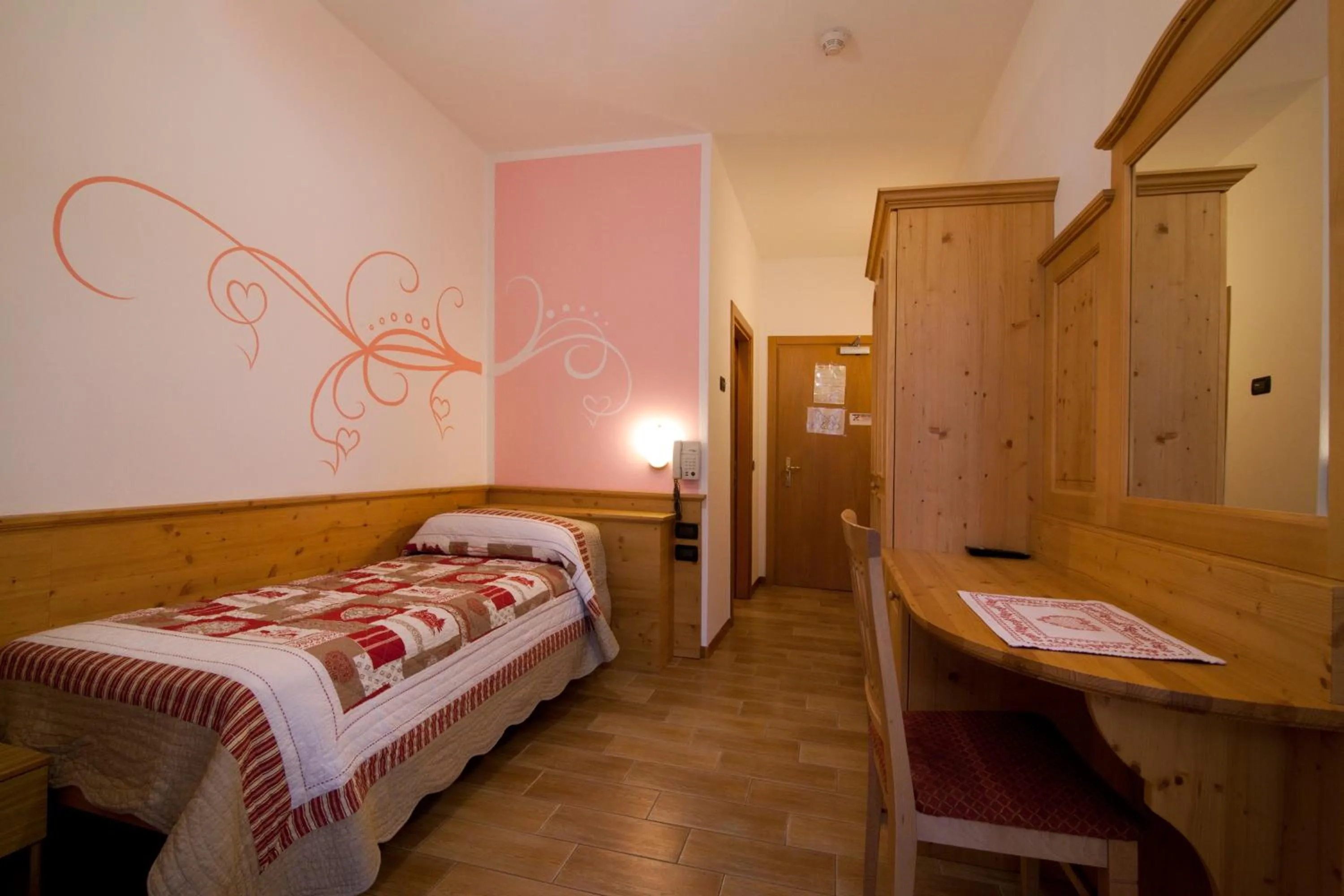 Living room, Bed in Hotel Sport