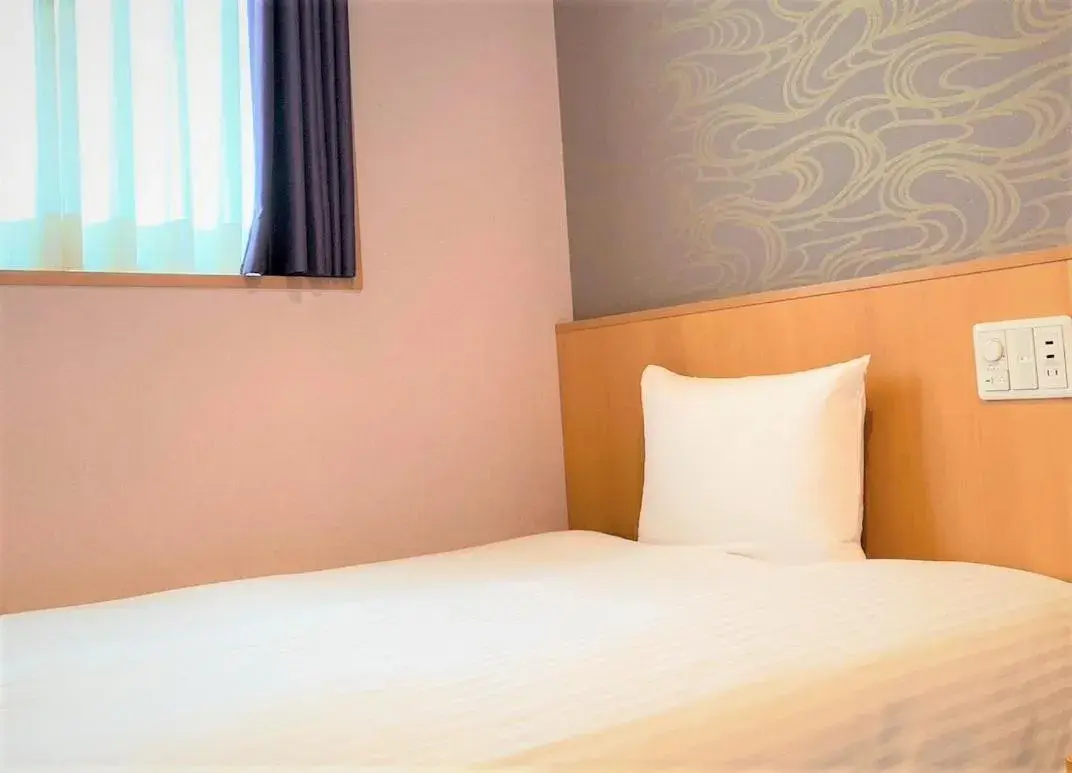 Bed in SAKURA SKY HOTEL KASHIWA(桜スカイホテル柏) Bed in SAKURA SKY HOTEL KASHIWA(桜スカイホテル柏)