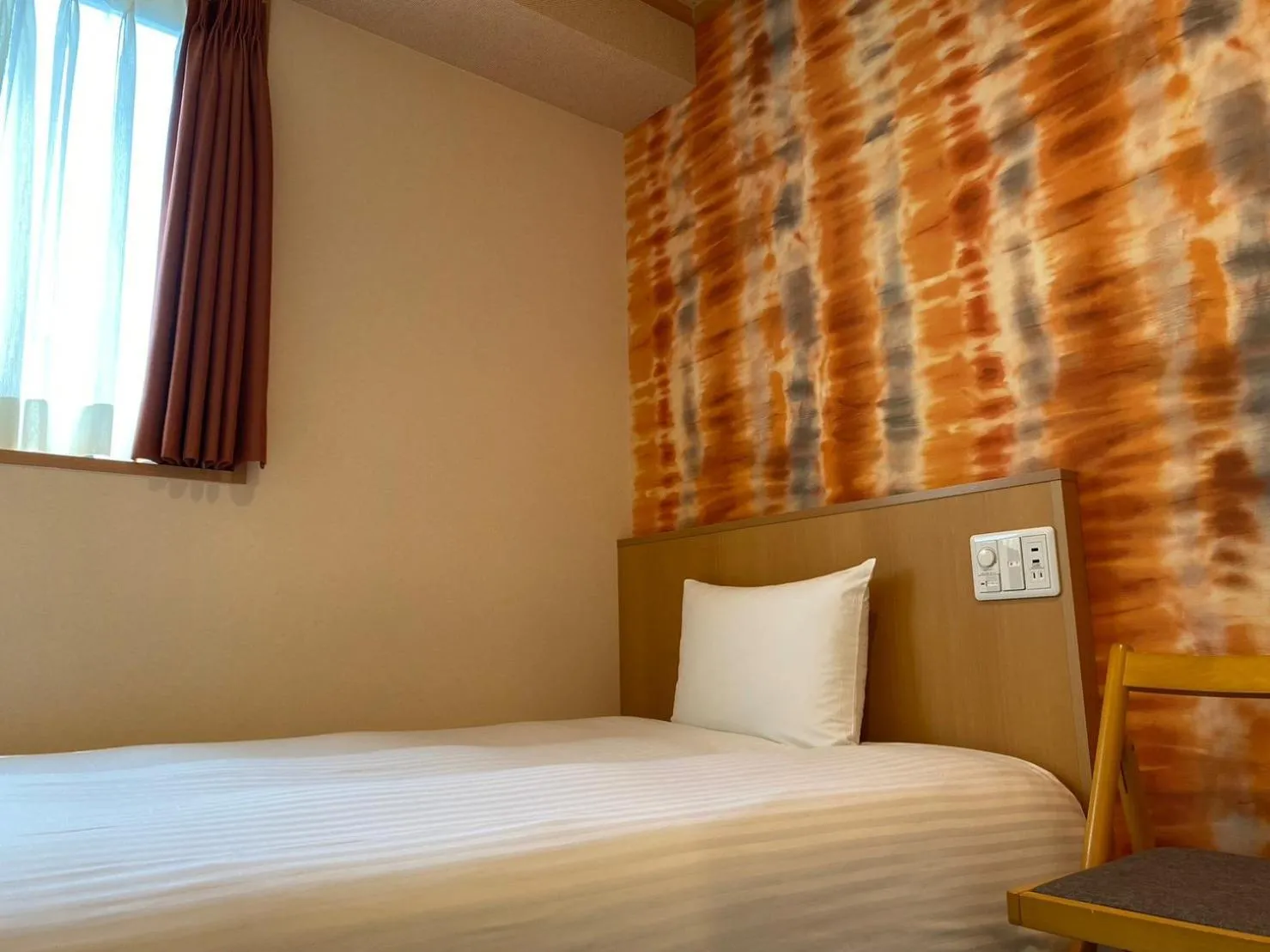 Bed in SAKURA SKY HOTEL KASHIWA(桜スカイホテル柏)