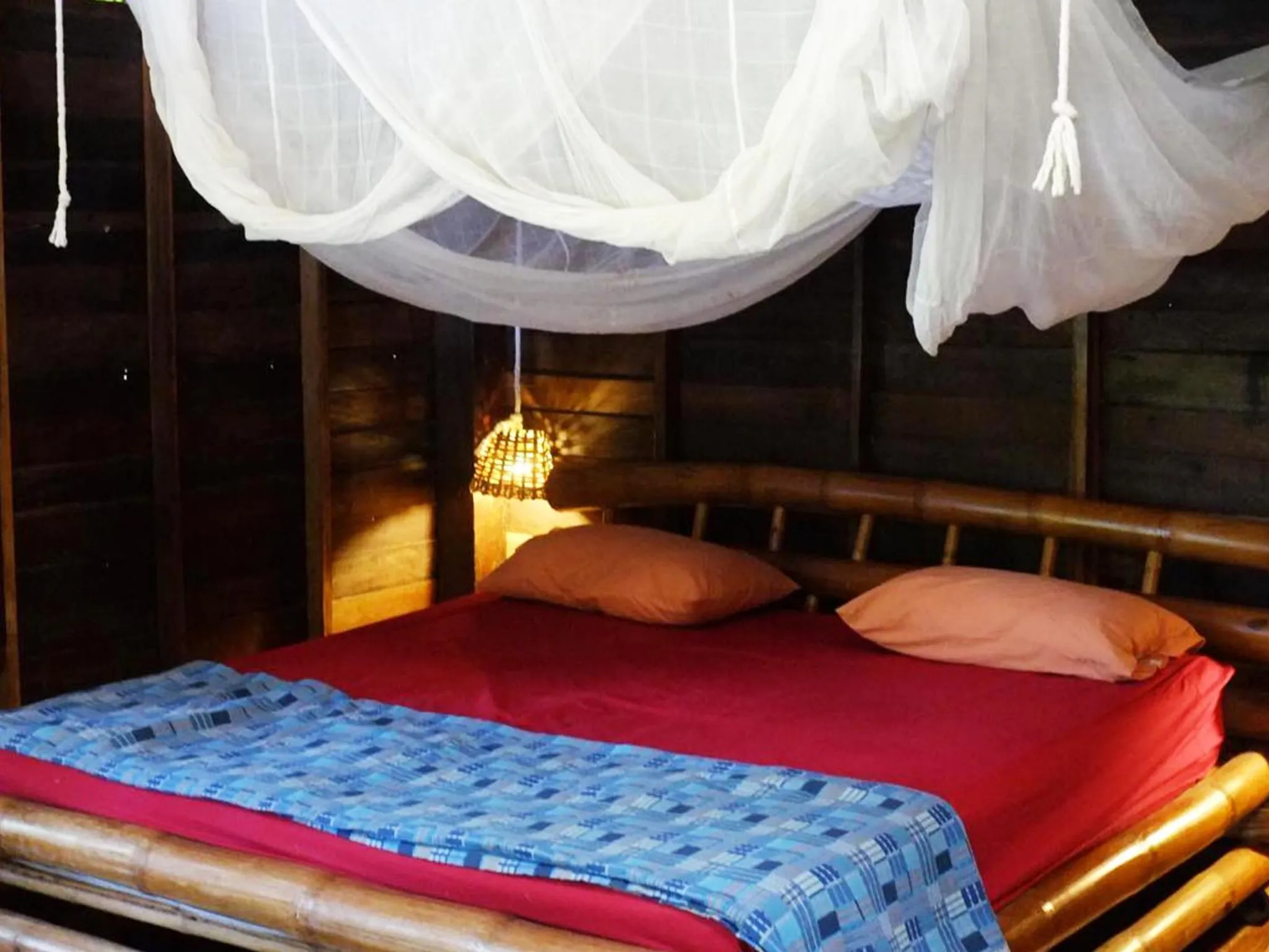 Bed in Bonhomie Beach Cottage