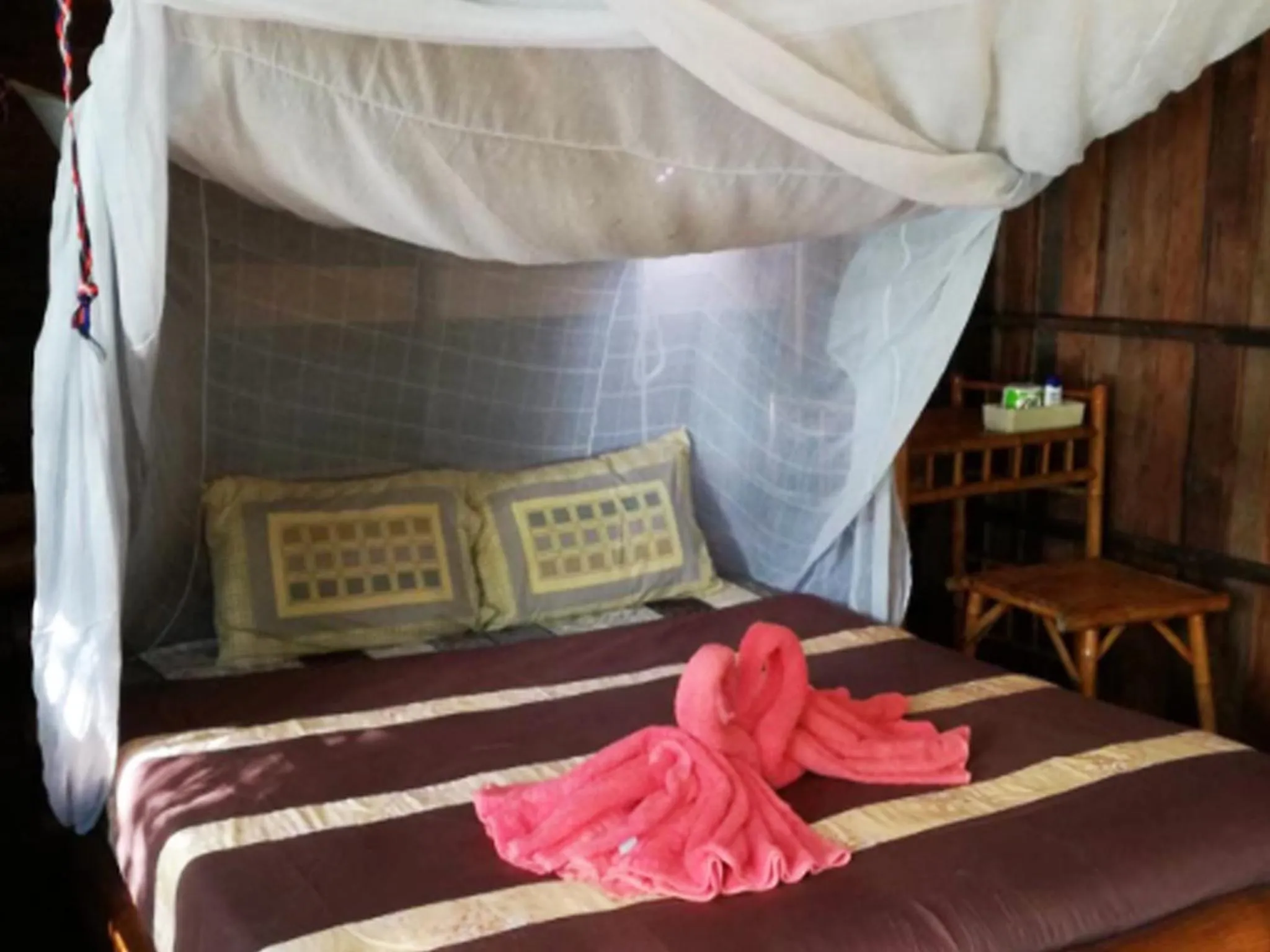 Bed in Bonhomie Beach Cottage