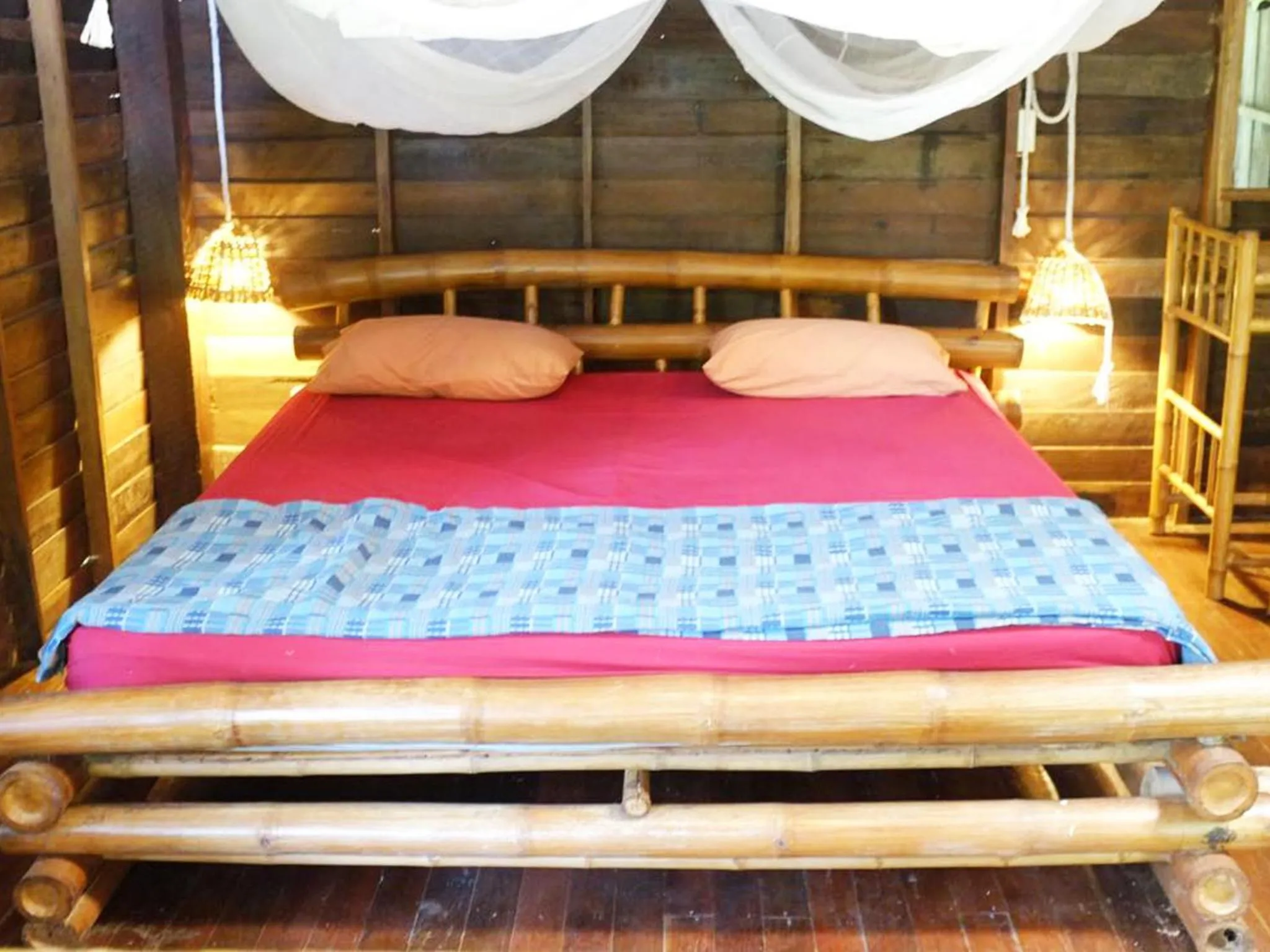 Bed in Bonhomie Beach Cottage