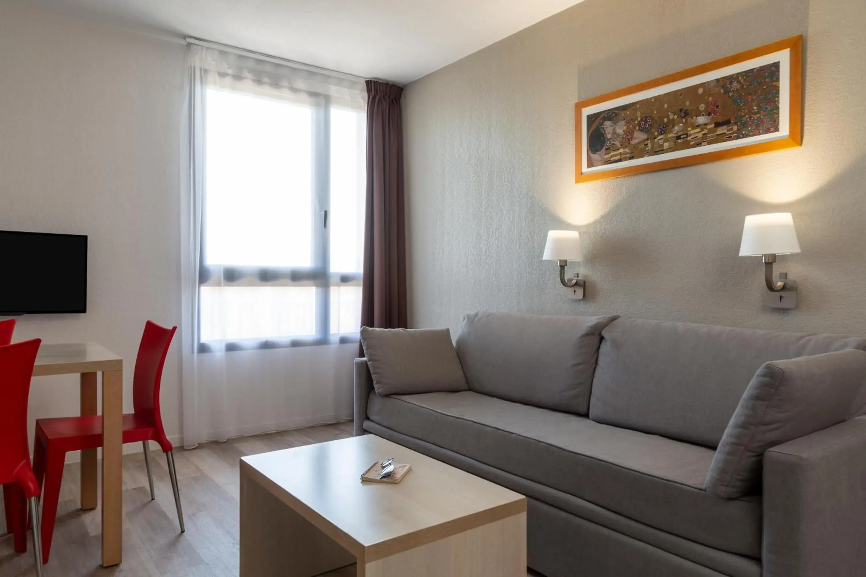 Living room in Aparthotel Adagio Access Avignon Living room in Aparthotel Adagio Access Avignon