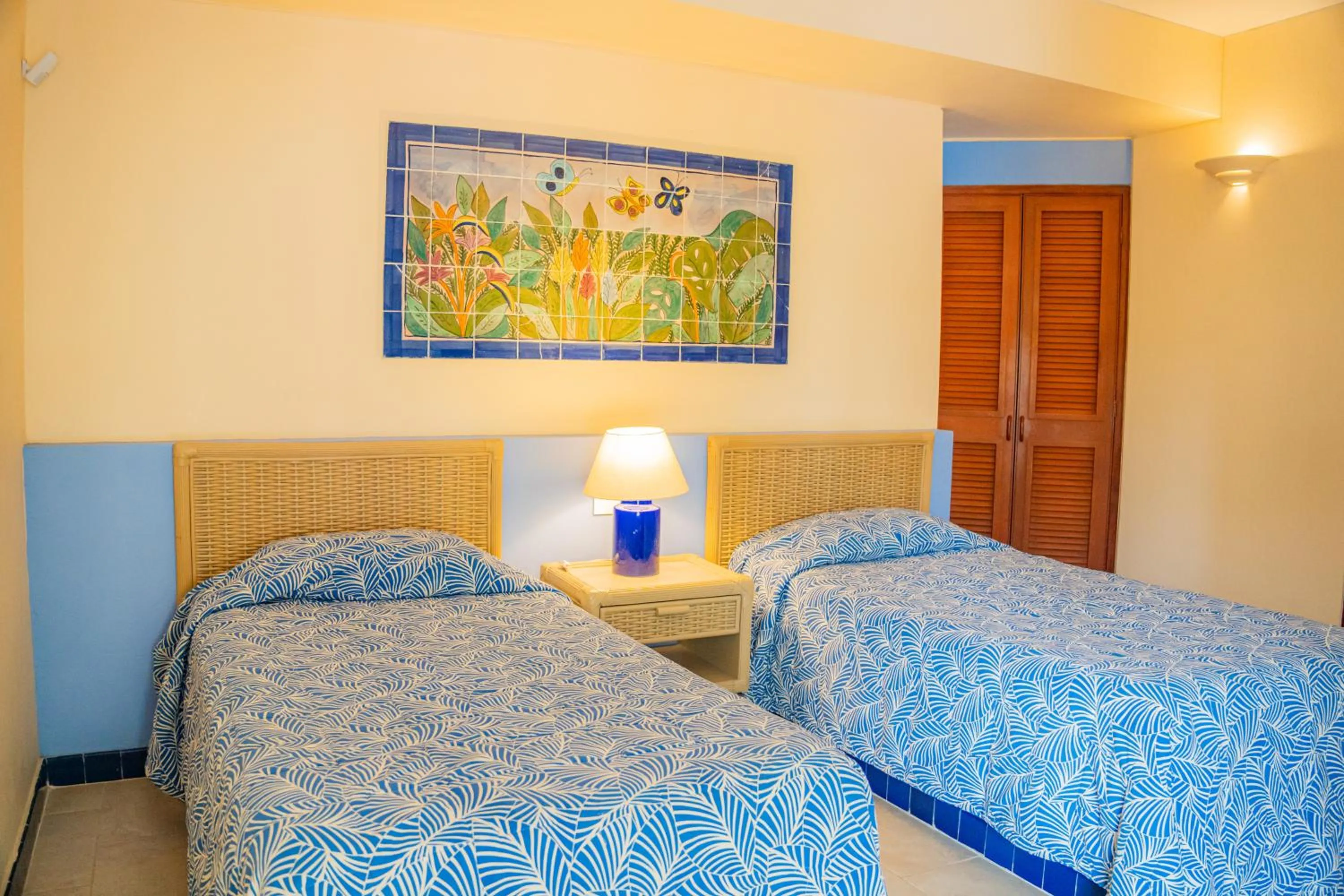 Bed in Zuana Beach Resort