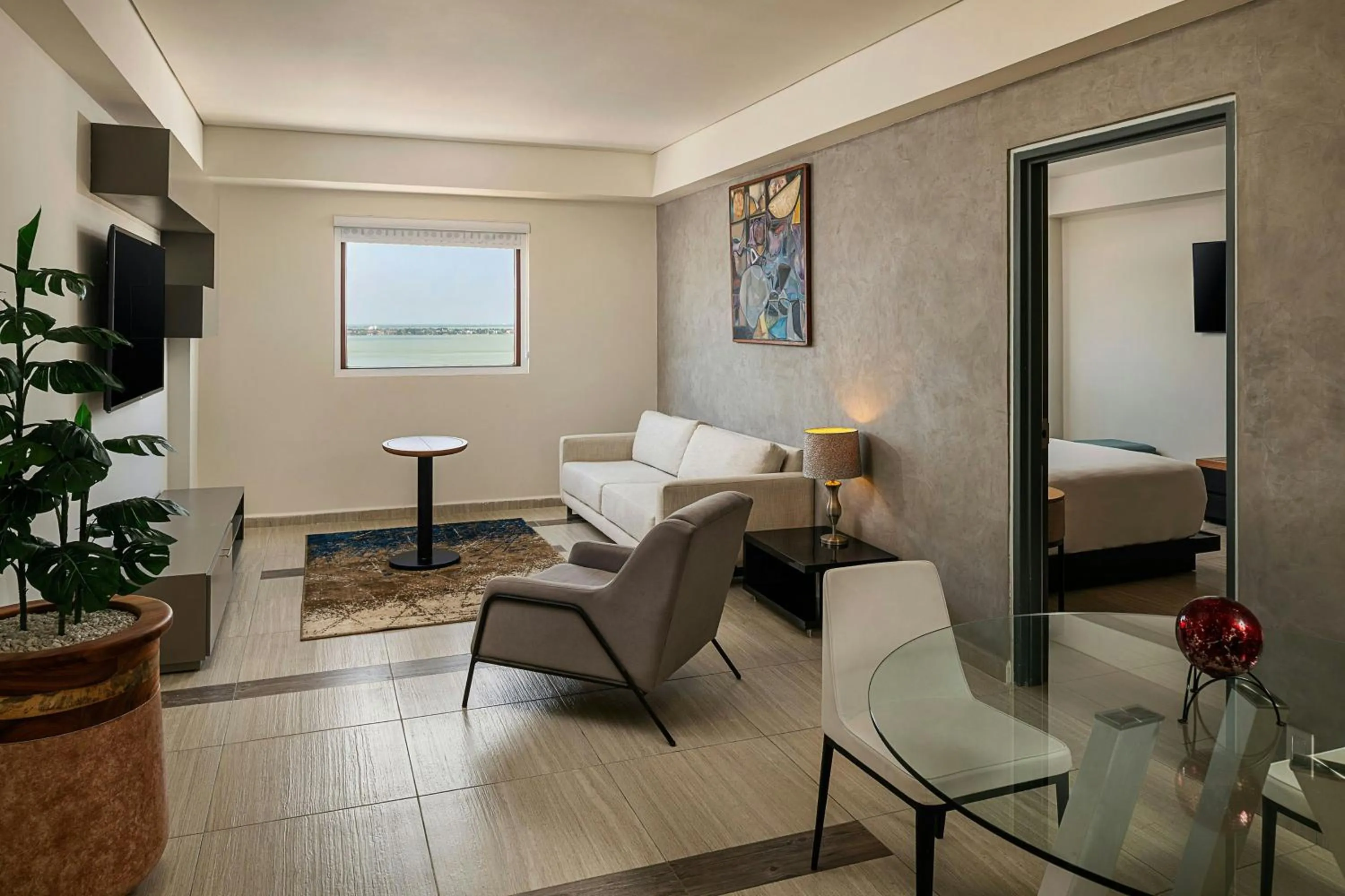 Living room, Bed in Aloft Cancun