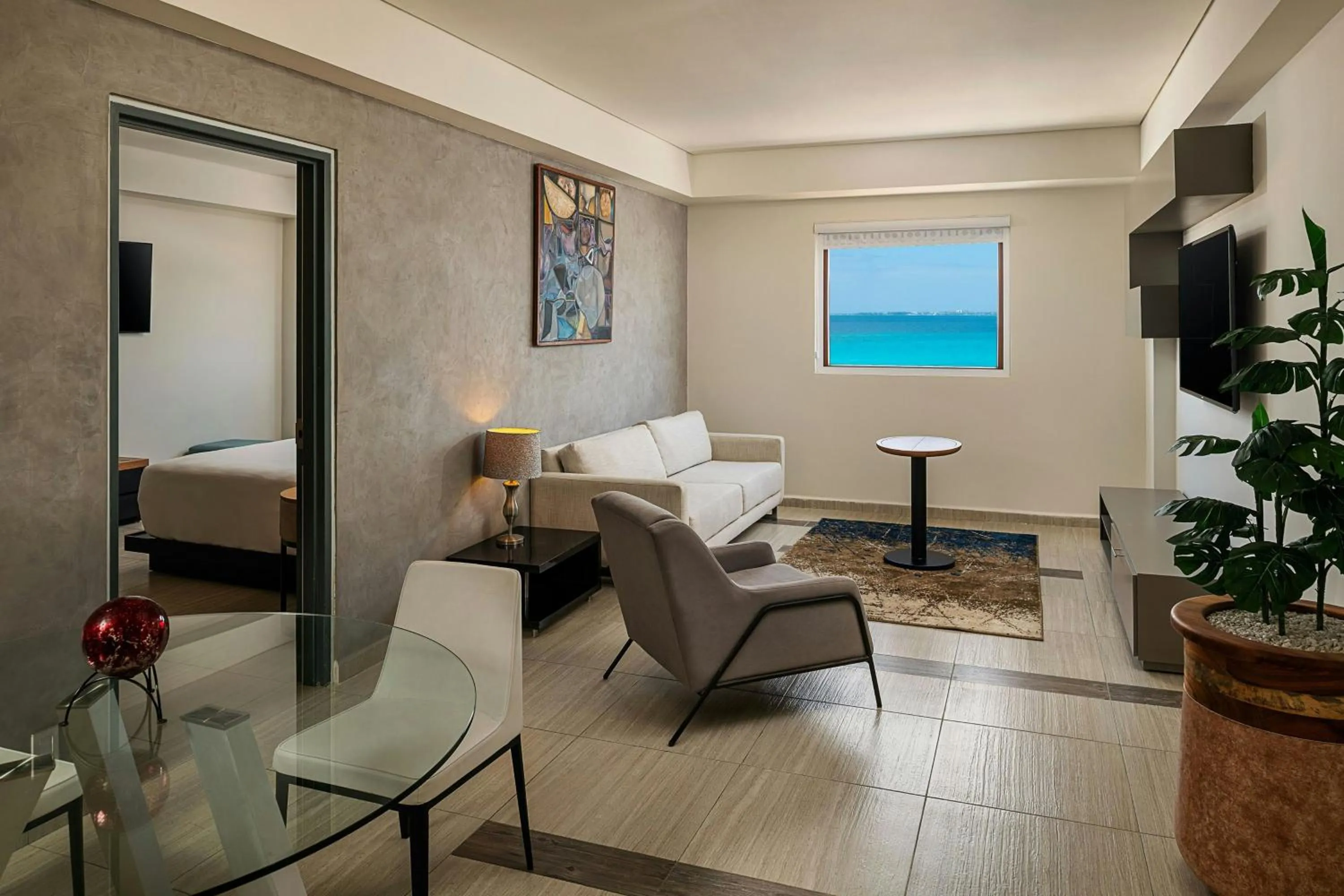 Living room, Bed in Aloft Cancun