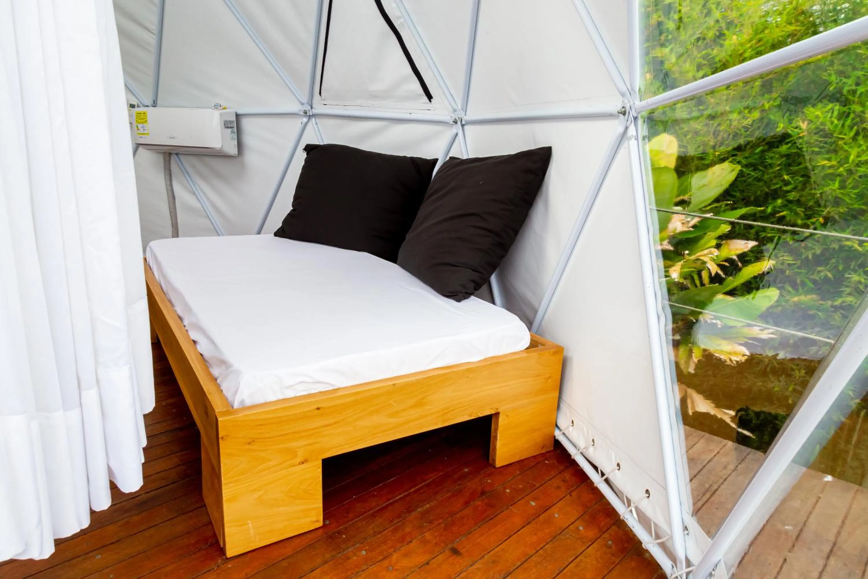 Bed in Ecohotel Monte Tierra Habitaciones y Glamping