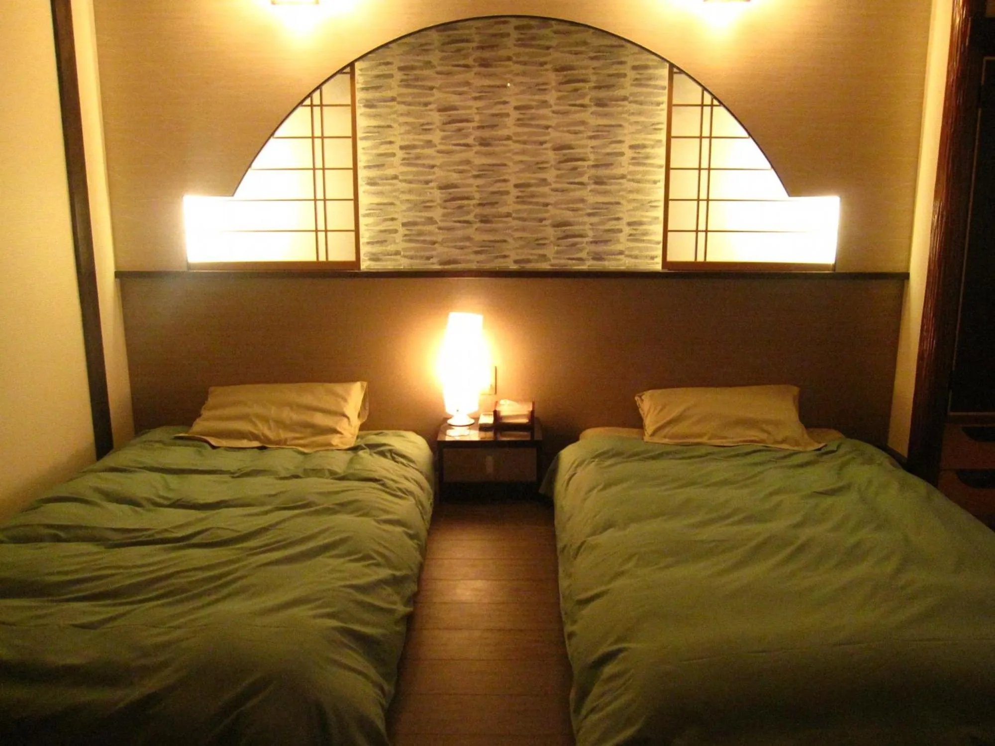 Bed in Inatori Tokai Hotel Yuen