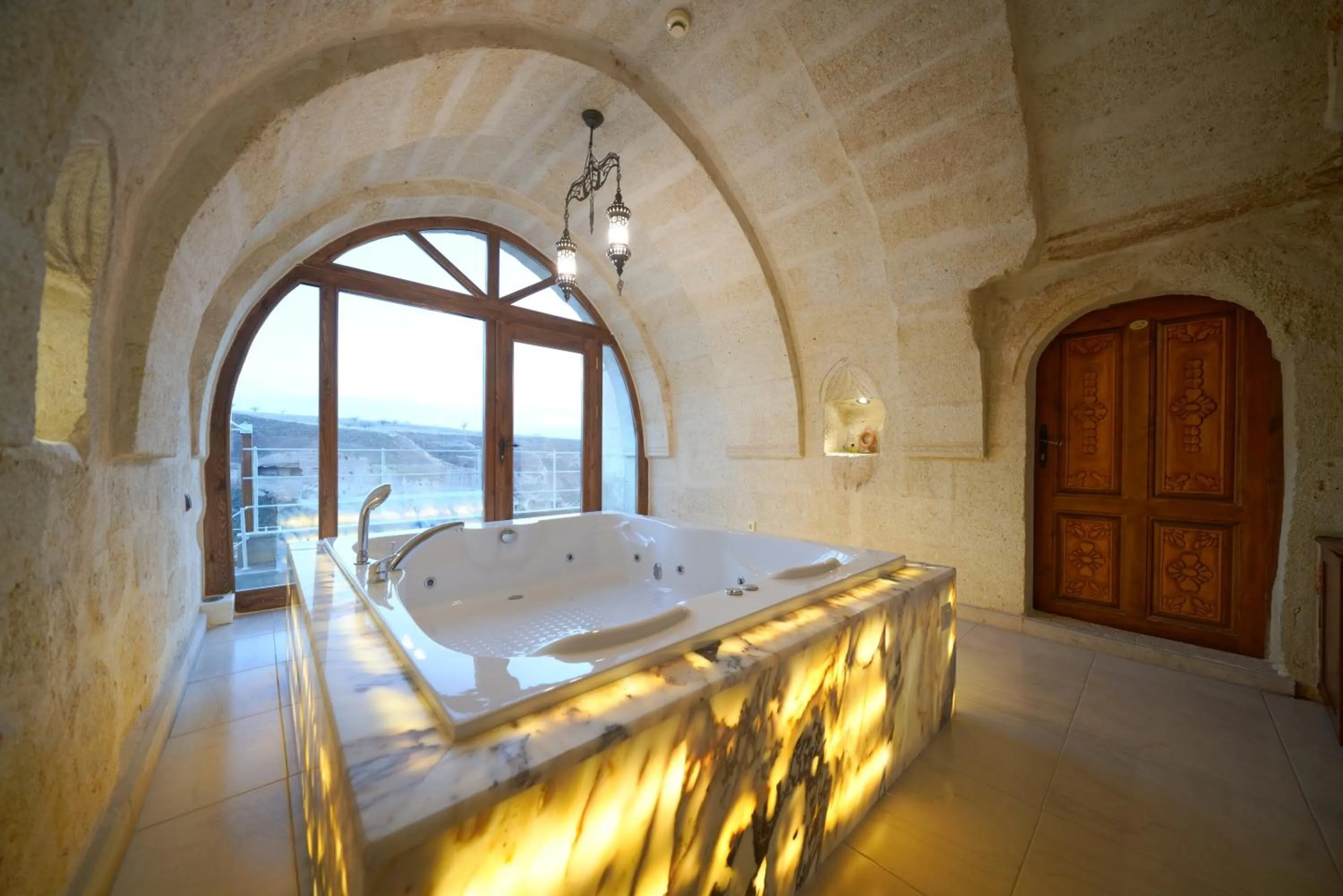 Hot Tub, Bed in Fairyland Cave Hotel