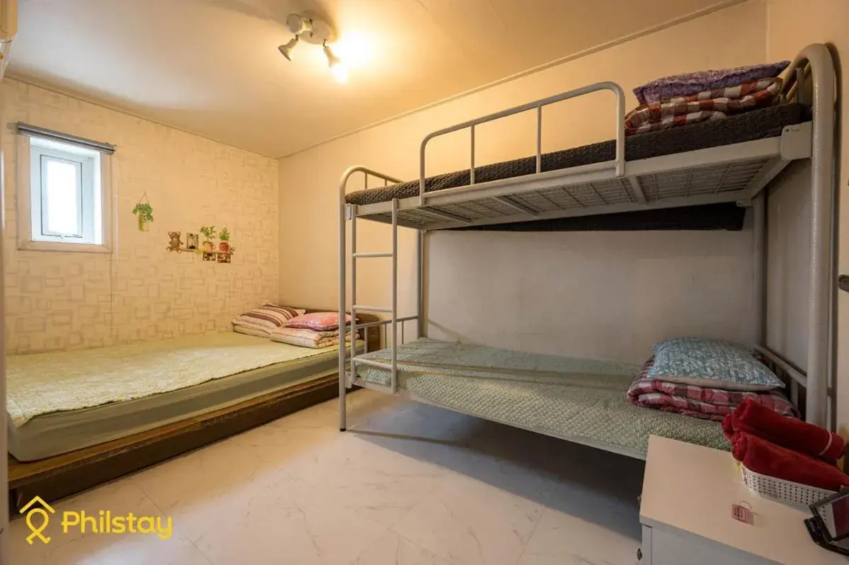 Bed in Mamas and Papas Guesthouse and Apartments in Seoul Bed in Mamas and Papas Guesthouse and Apartments in Seoul