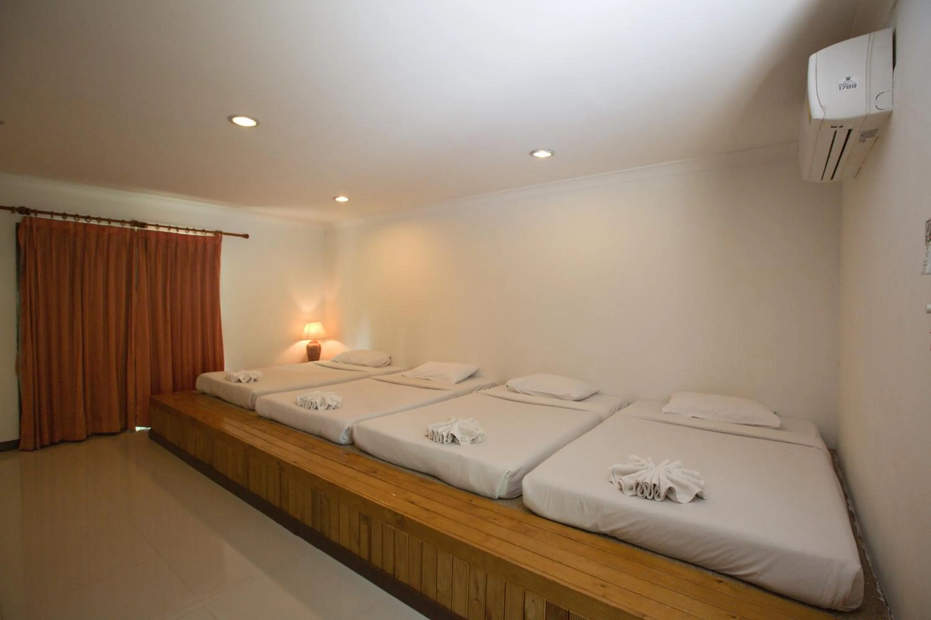 Bed in Muaklek Paradise Resort