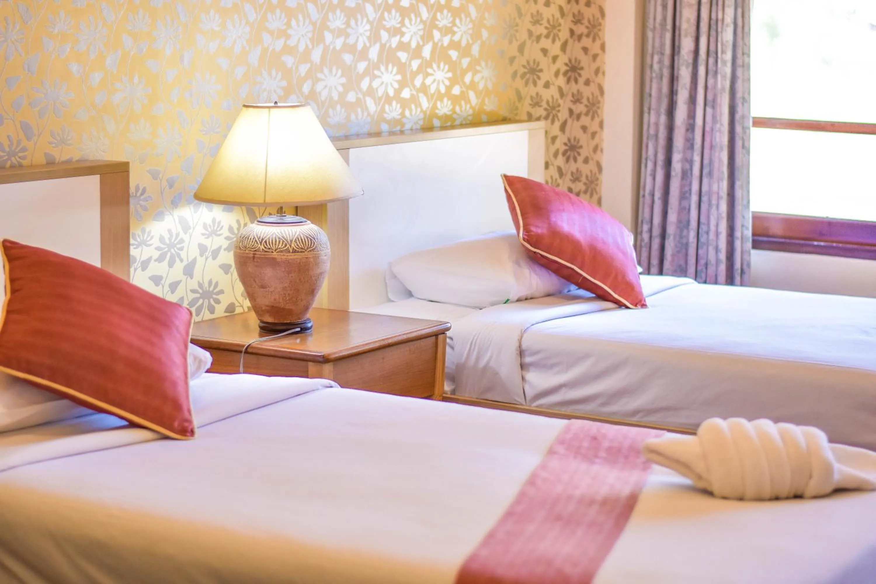 Bed in Muaklek Paradise Resort