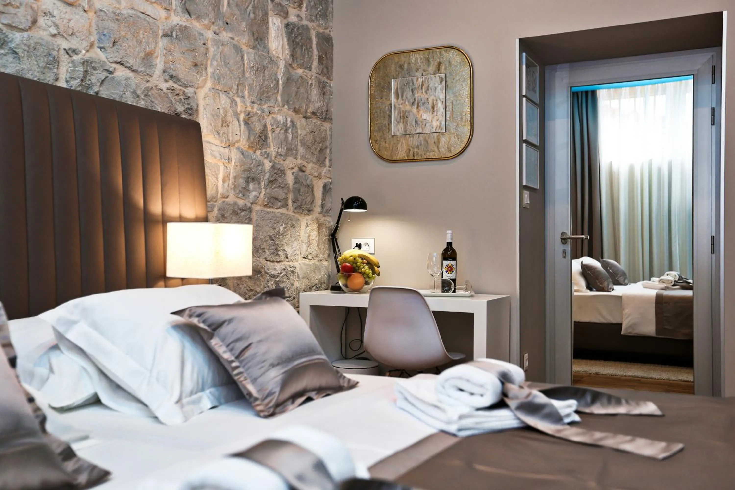 Decorative detail, Bed in Riva Luxury Rooms