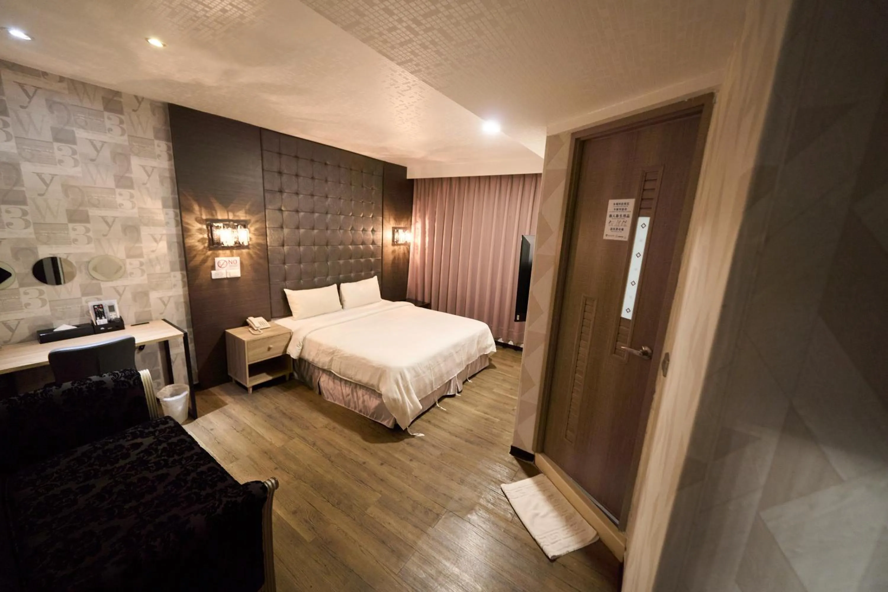 Bed in The Riverside Hotel Fashion