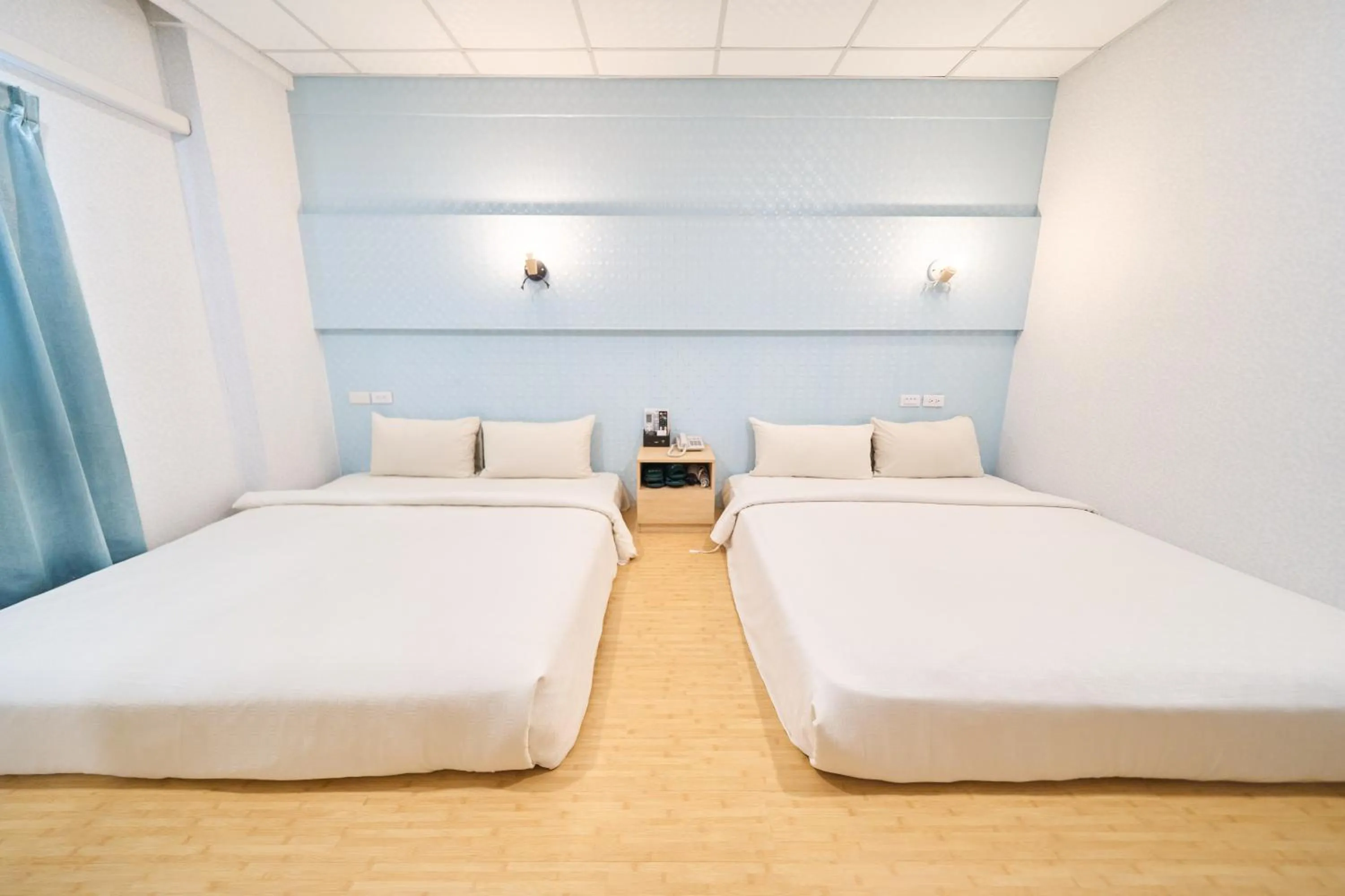 Bed in The Riverside Hotel Fashion