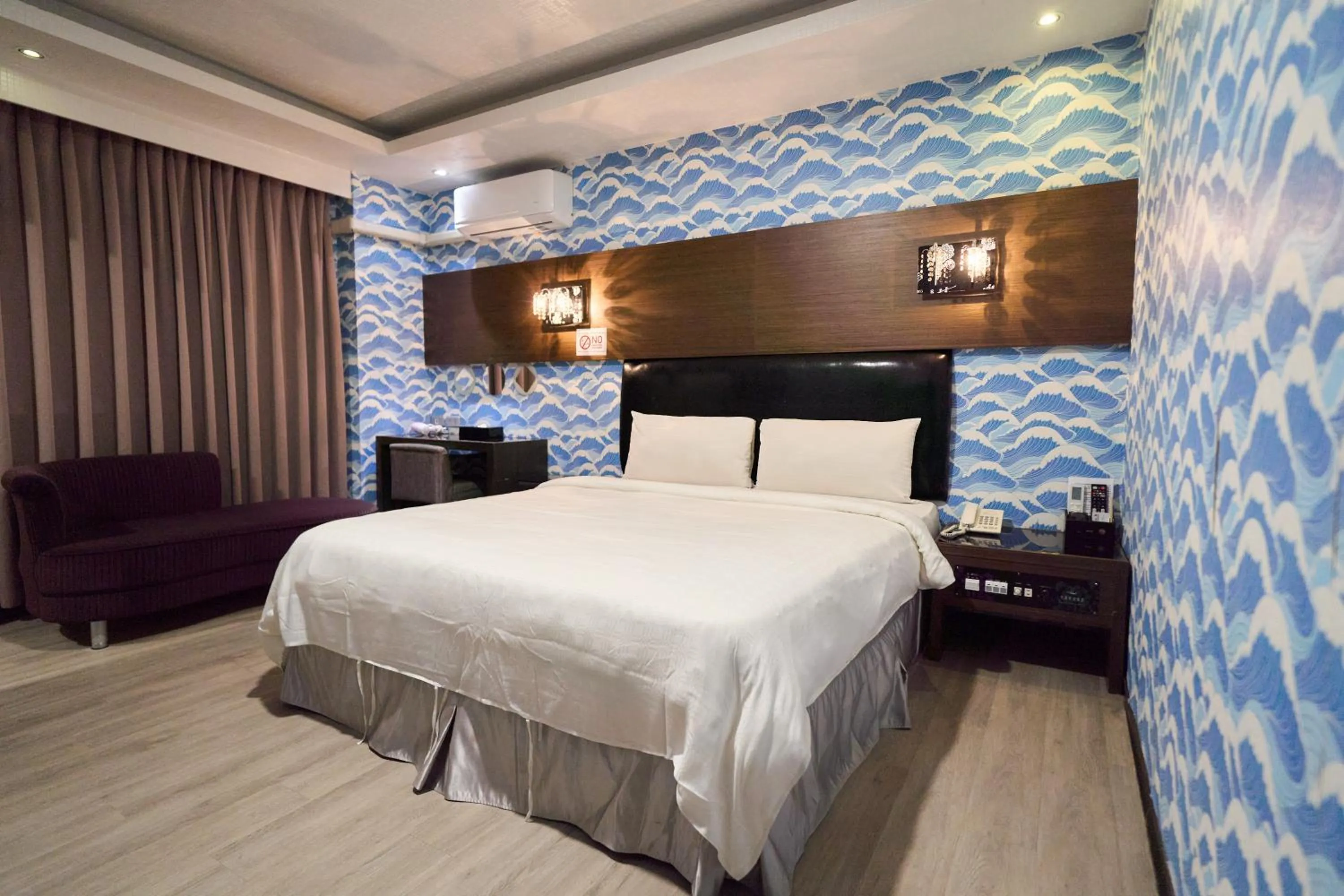 Bed in The Riverside Hotel Fashion