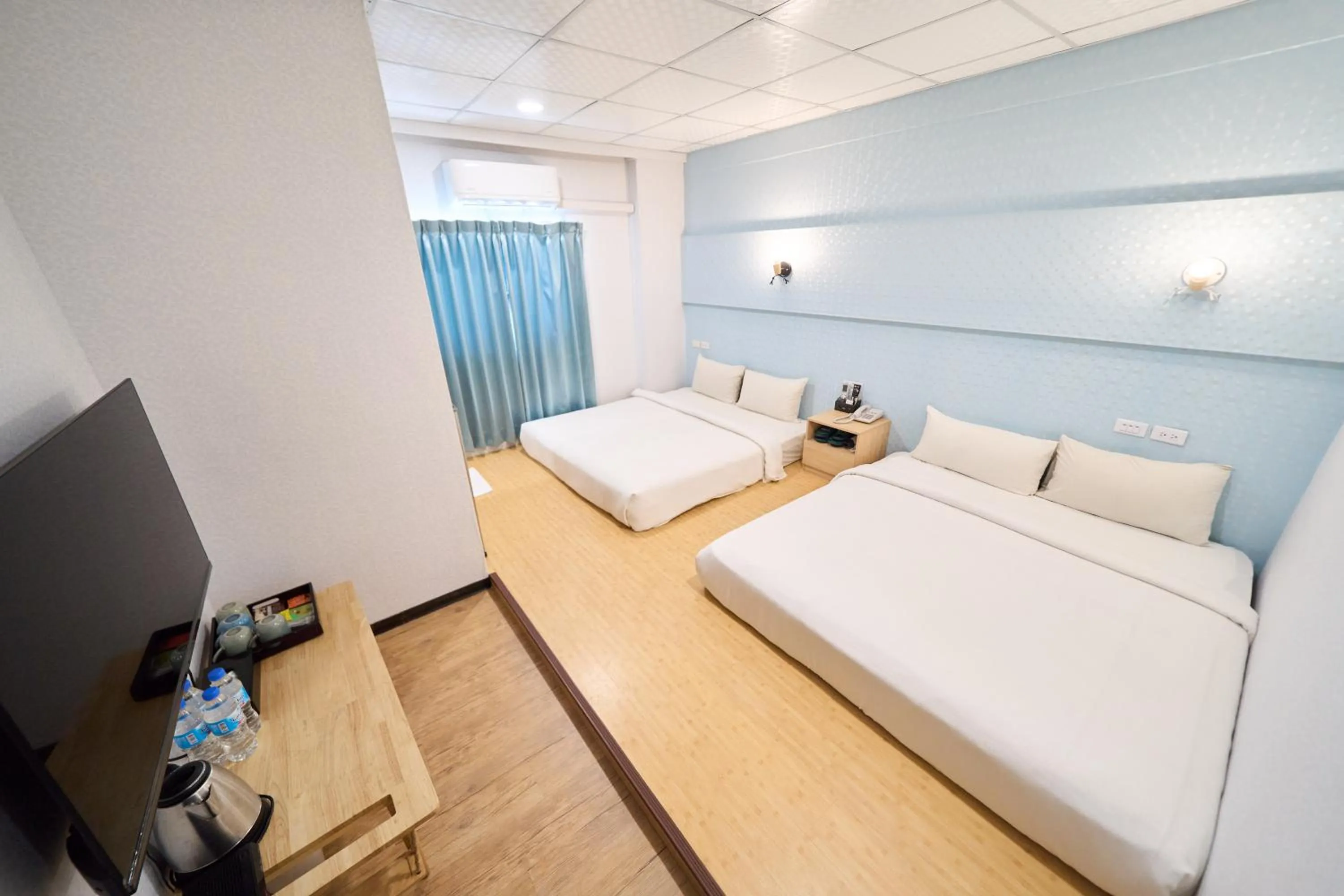 Bed in The Riverside Hotel Fashion