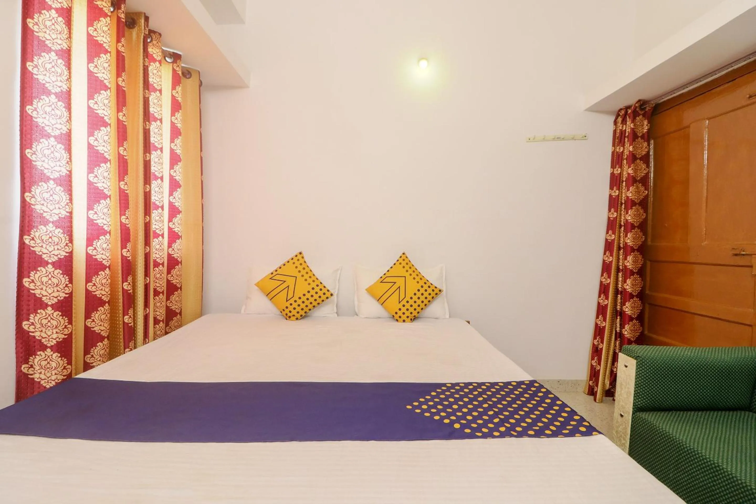 Bedroom in SPOT ON Hotel Om Kanha